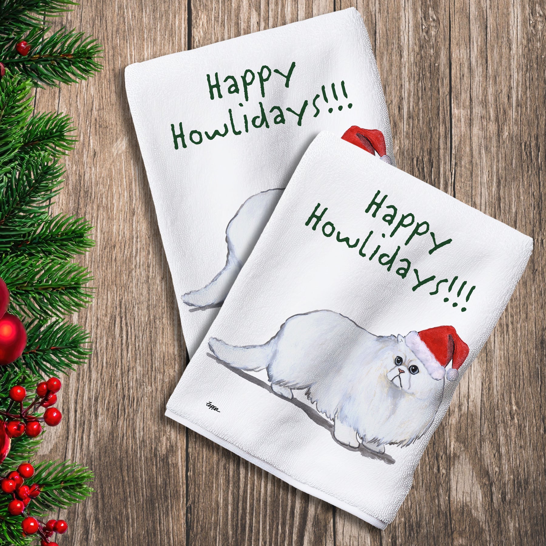 2 Kitchen Towels with a Persian Cat in a Santa Hat and Happy Howlidays text.
