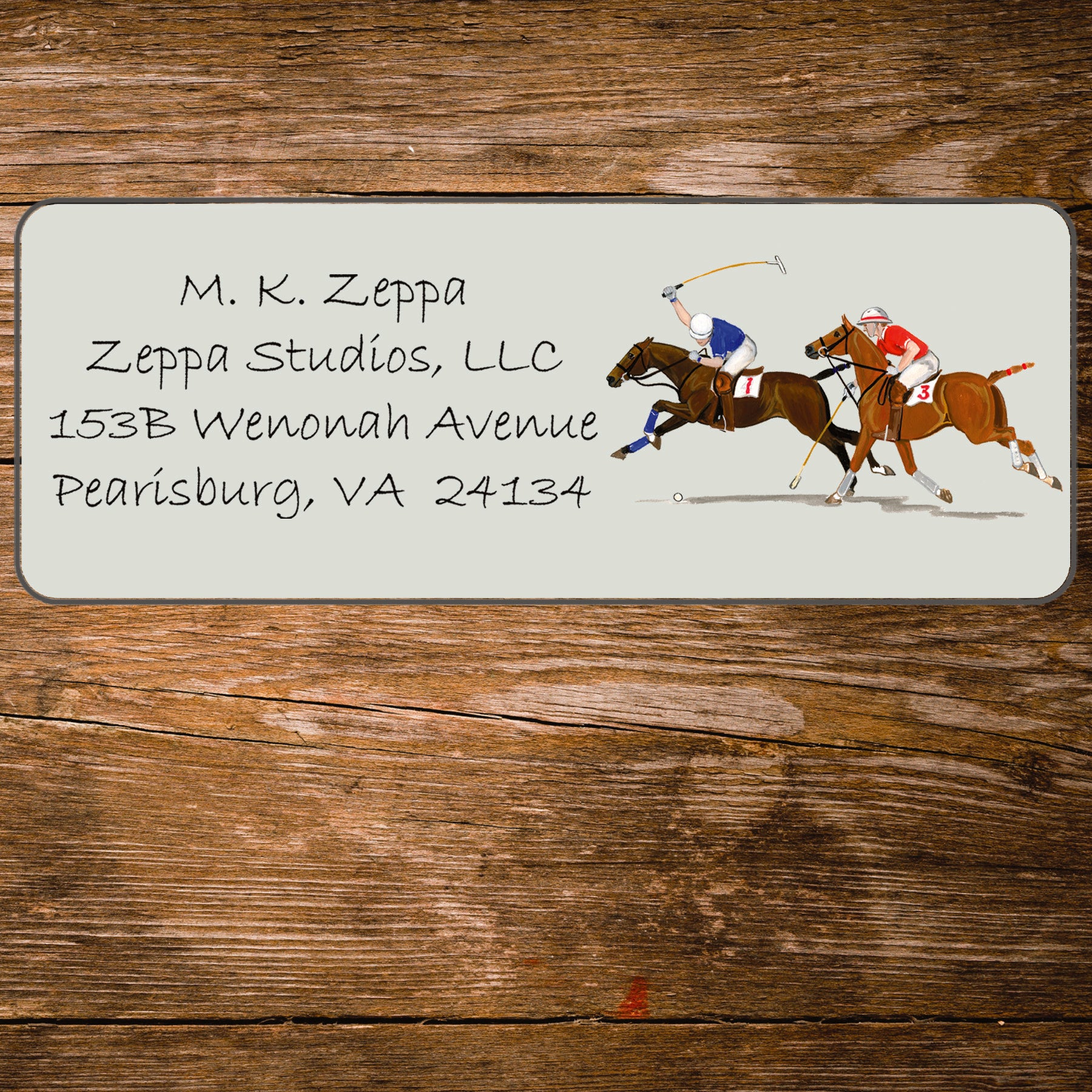 Address label with a polo players illustration on a wooden background