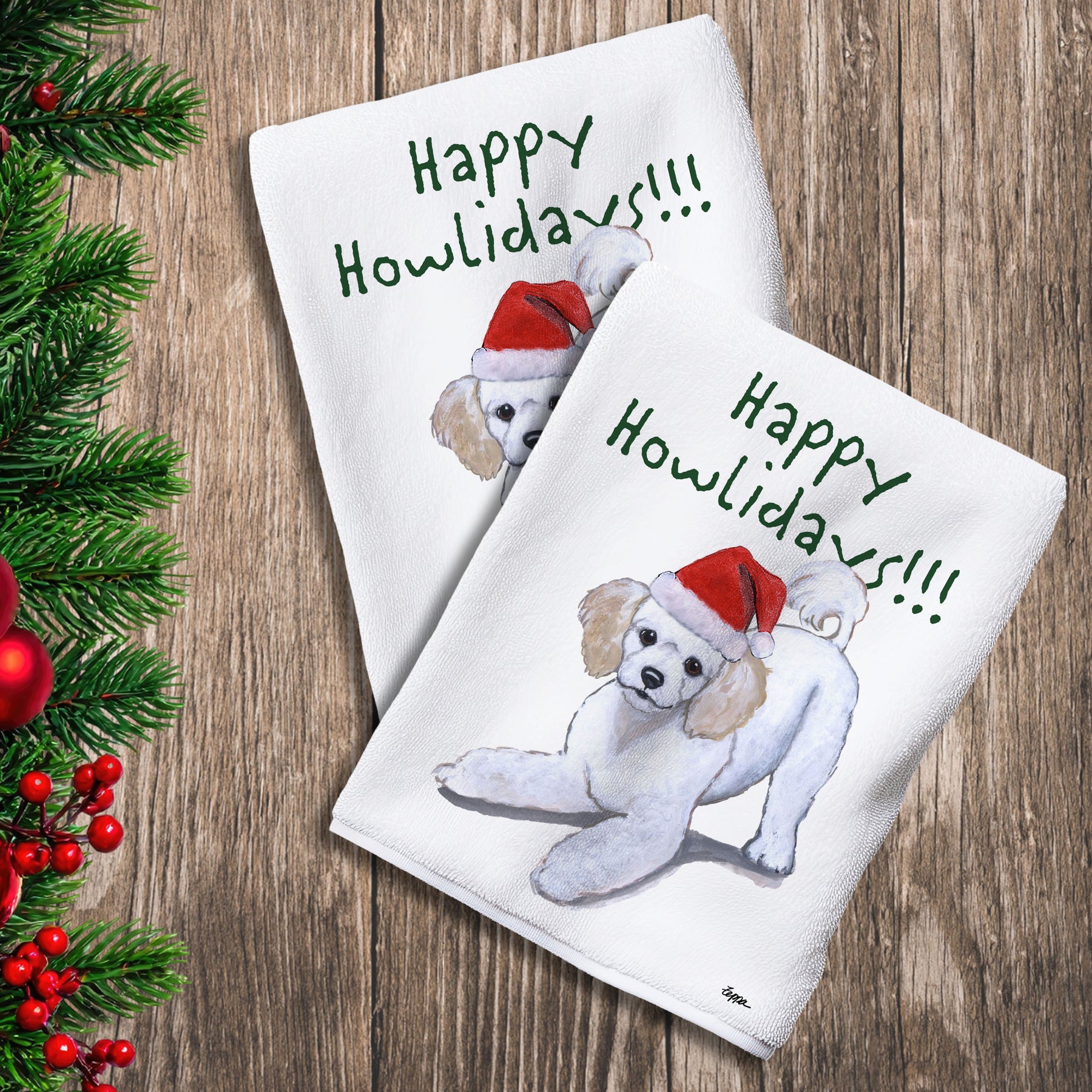 2 Kitchen Towels with a Poodle puppy in a Santa Hat and Happy Howlidays text.
