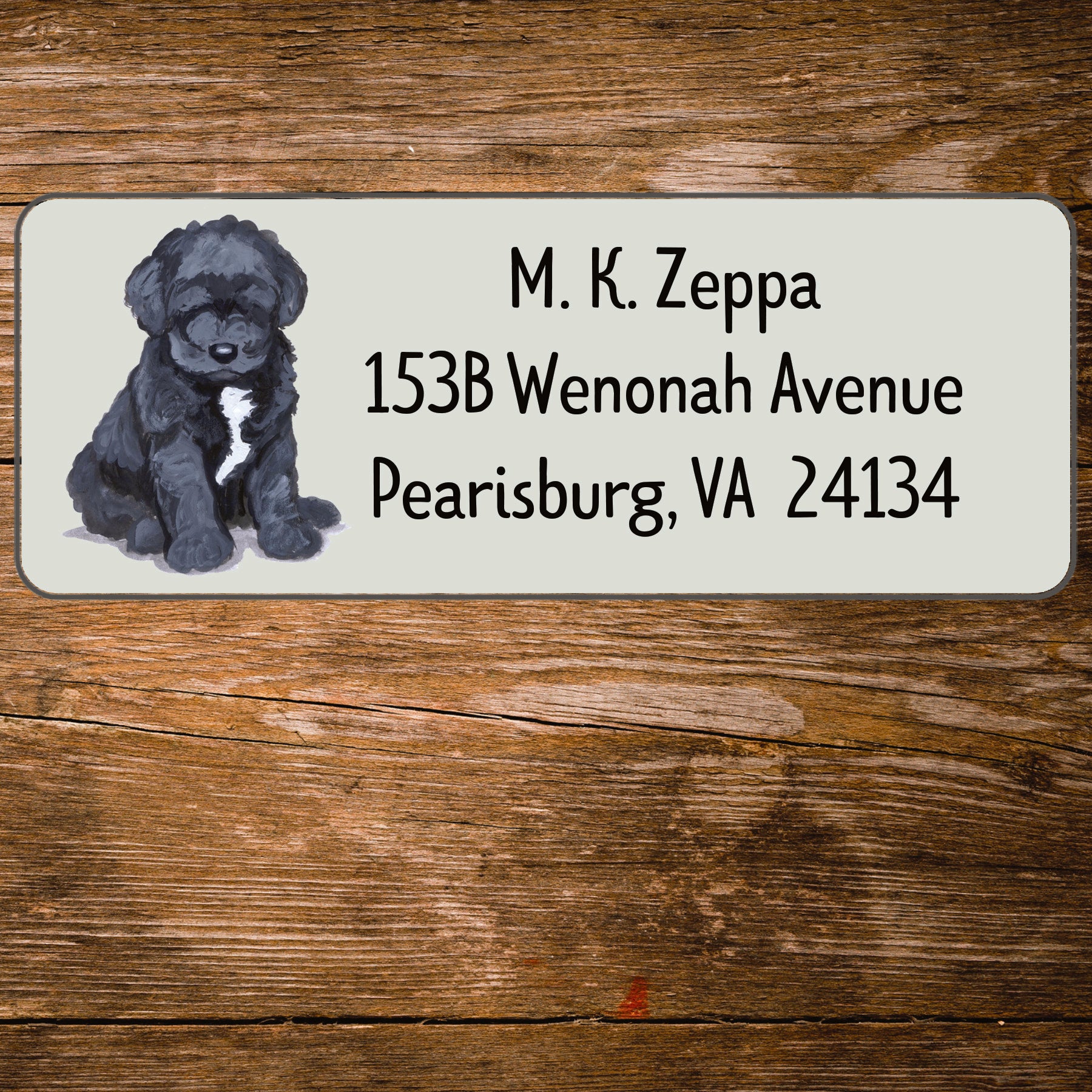 Return address label with a Portuguese Water Dog illustration.