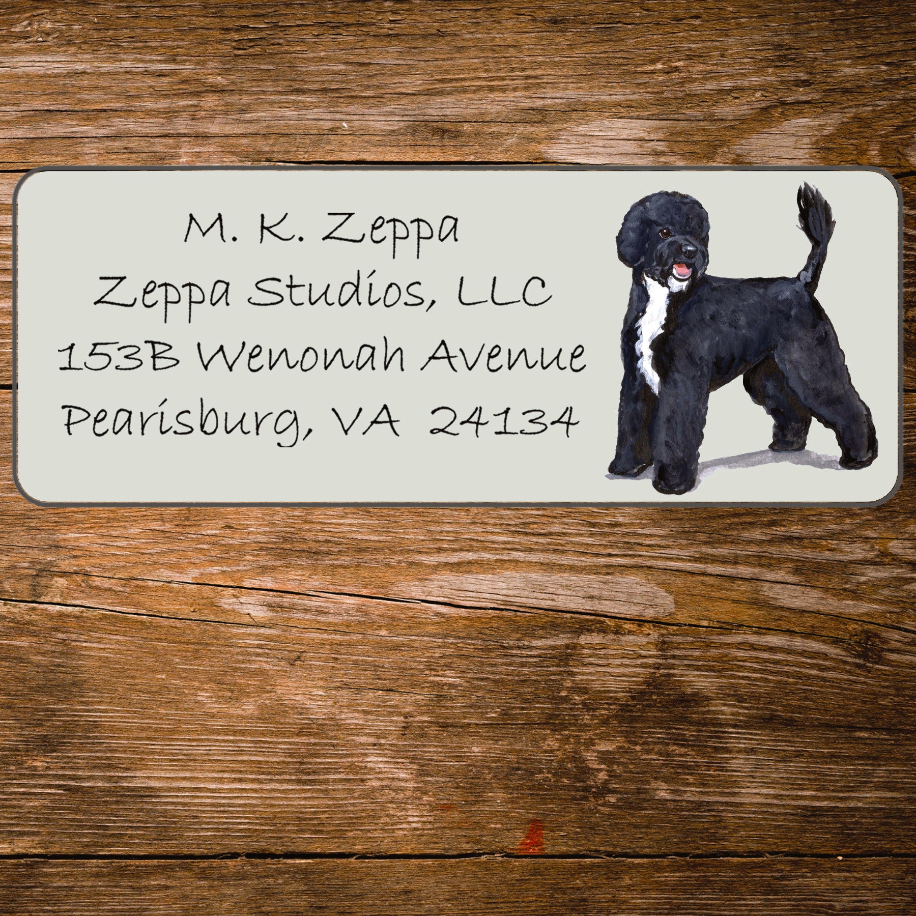 Return address label with a Portuguese Water Dog illustration.