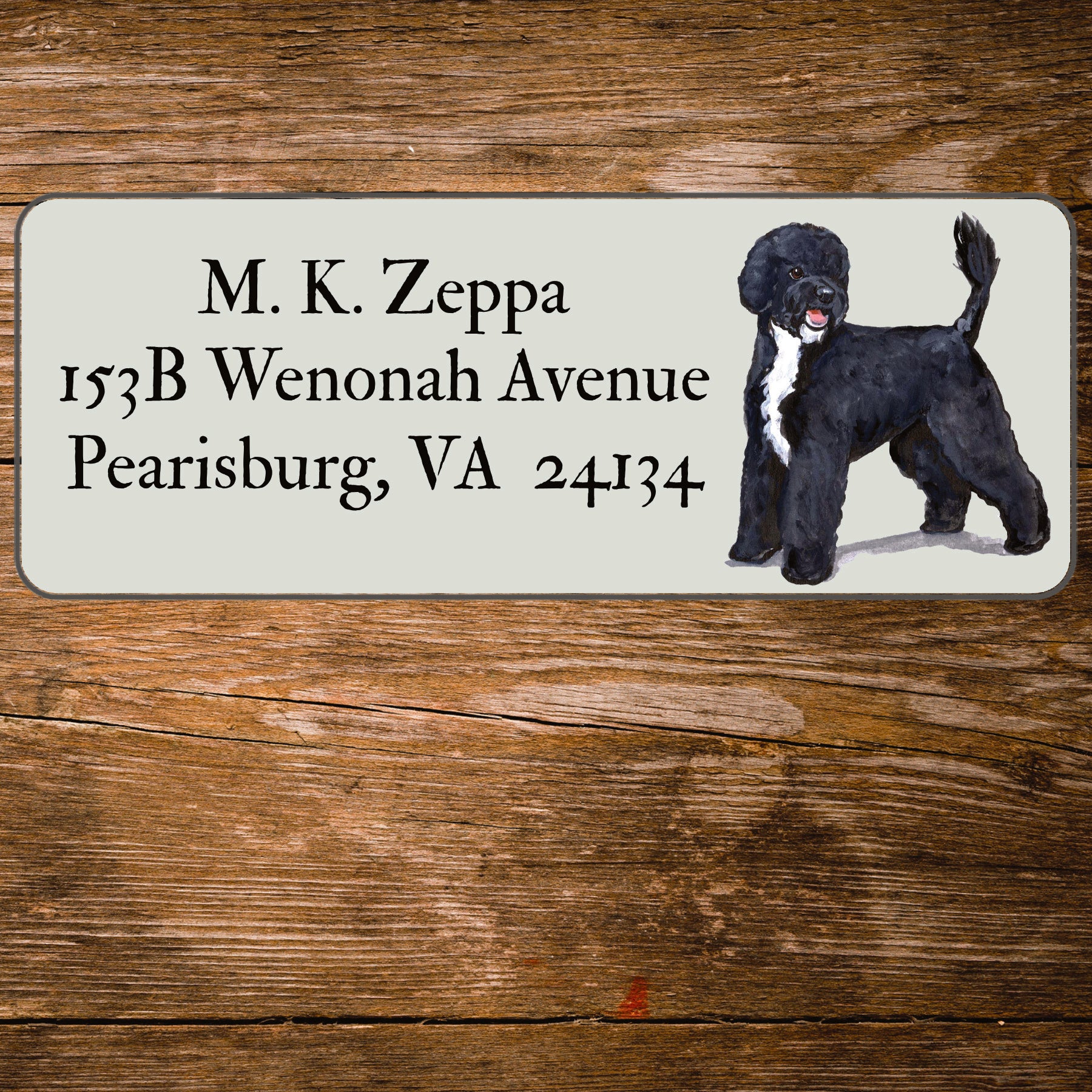 Return address label with a Portuguese Water Dog illustration.