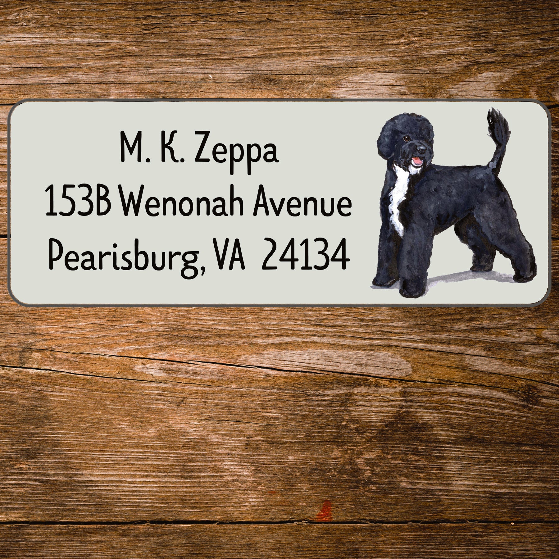 Return address label with a Portuguese Water Dog illustration.