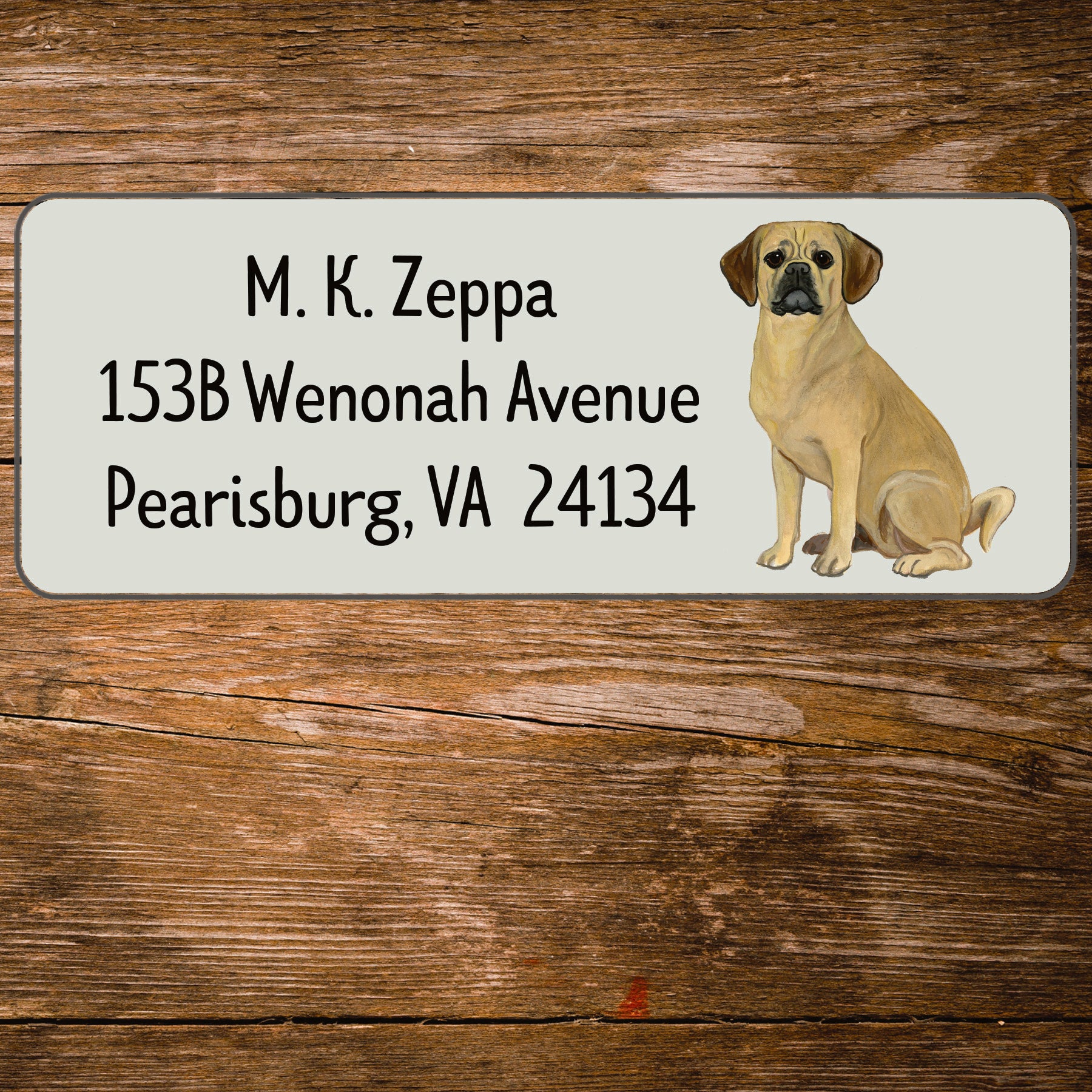 Return address label with an illustration of a Puggle.