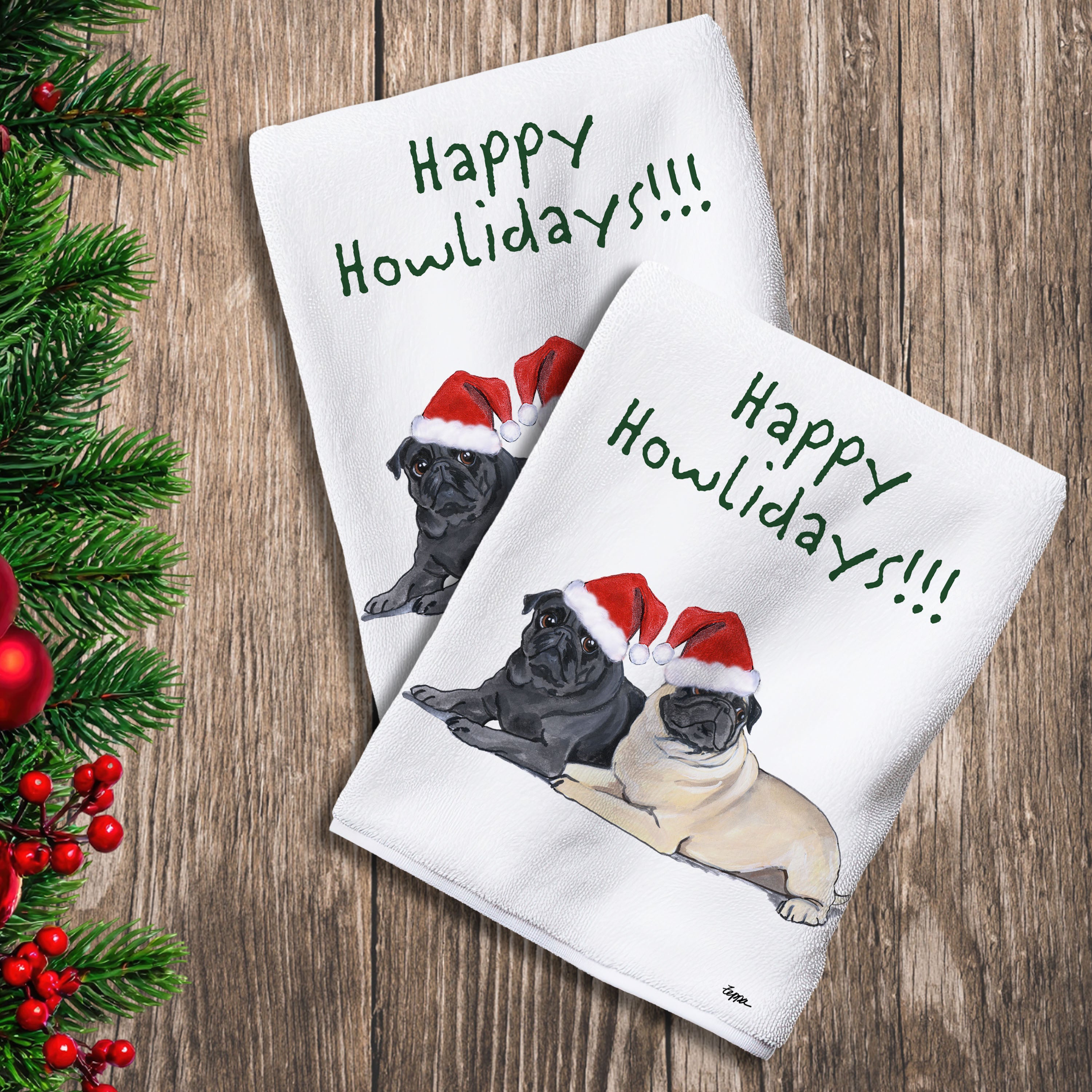 2 Kitchen Towels with a pair of Pugs in a Santa Hat and Happy Howlidays text.
