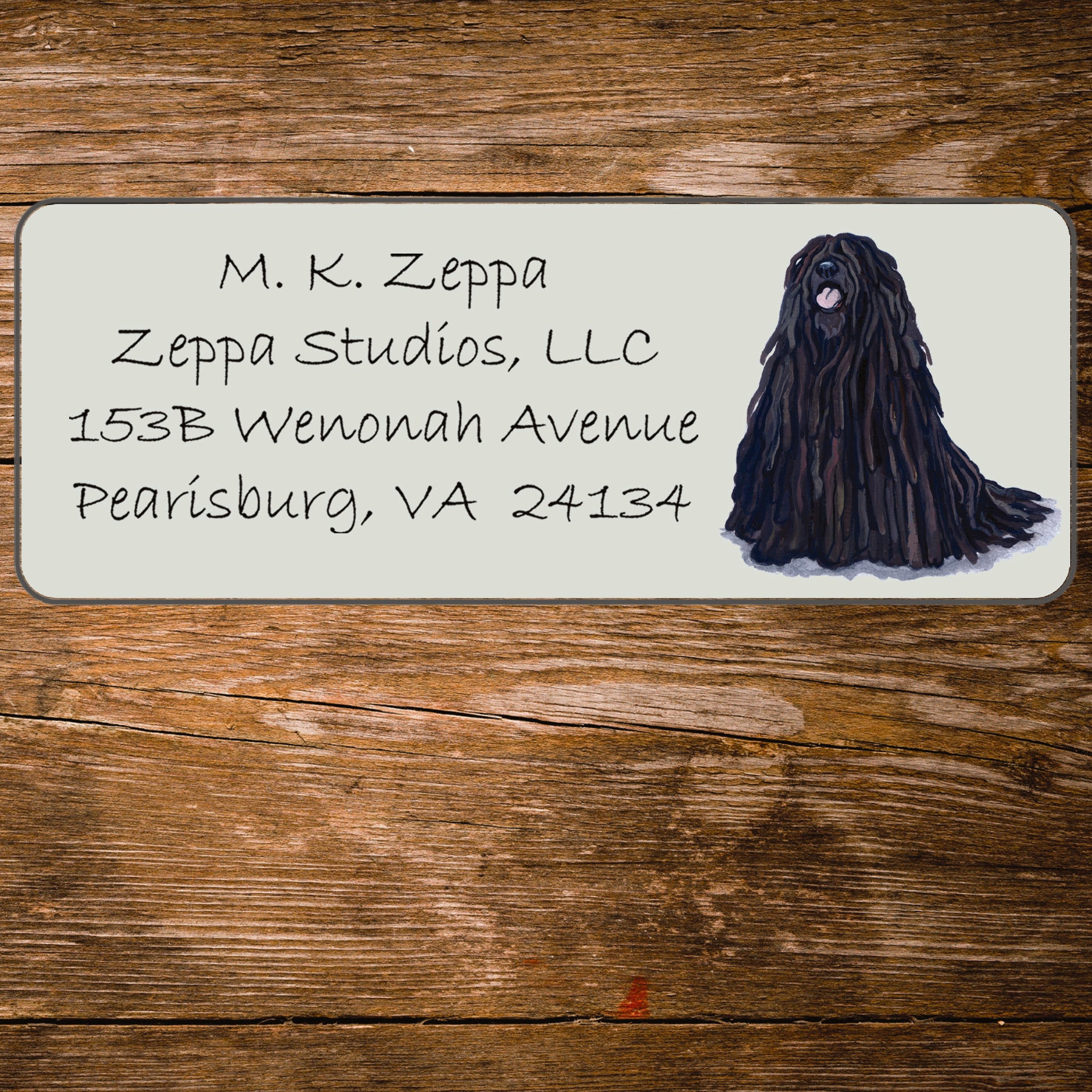 Return address label with a Puli illustration.