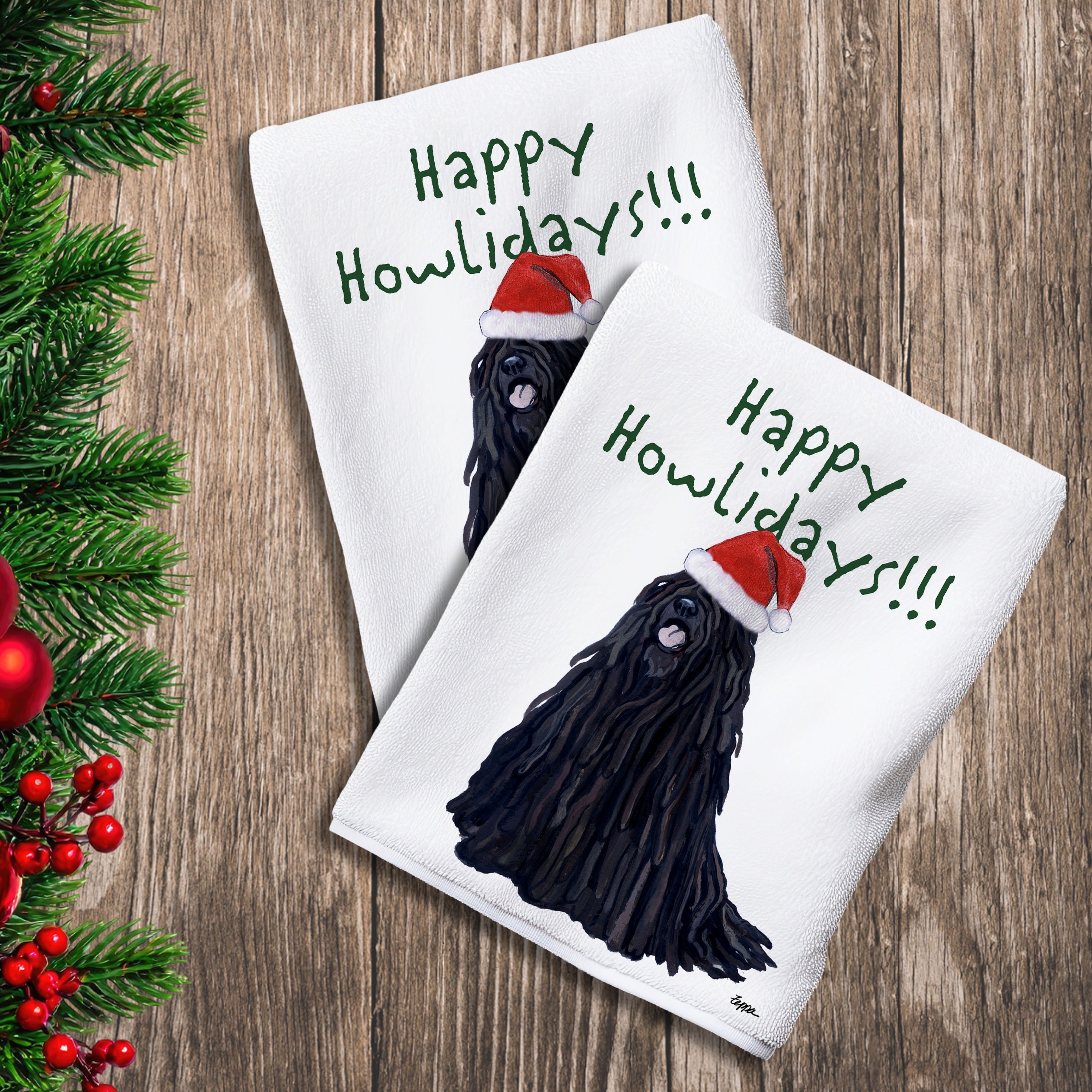 2 Kitchen Towels with a Puli in a Santa Hat and Happy Howlidays text.
