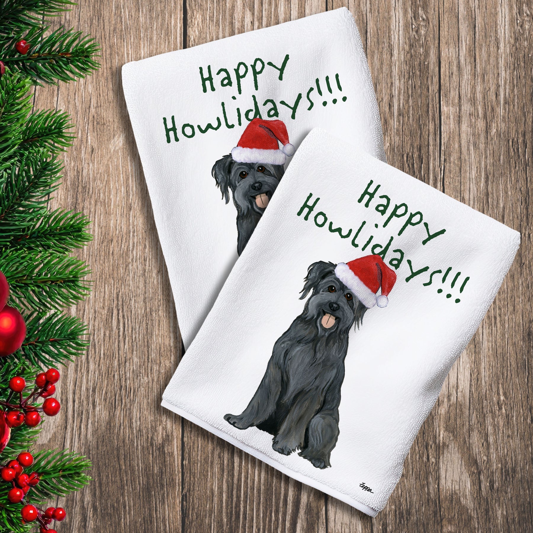2 Kitchen Towels with a Pyrenean Shepherd in a Santa Hat and Happy Howlidays text.
