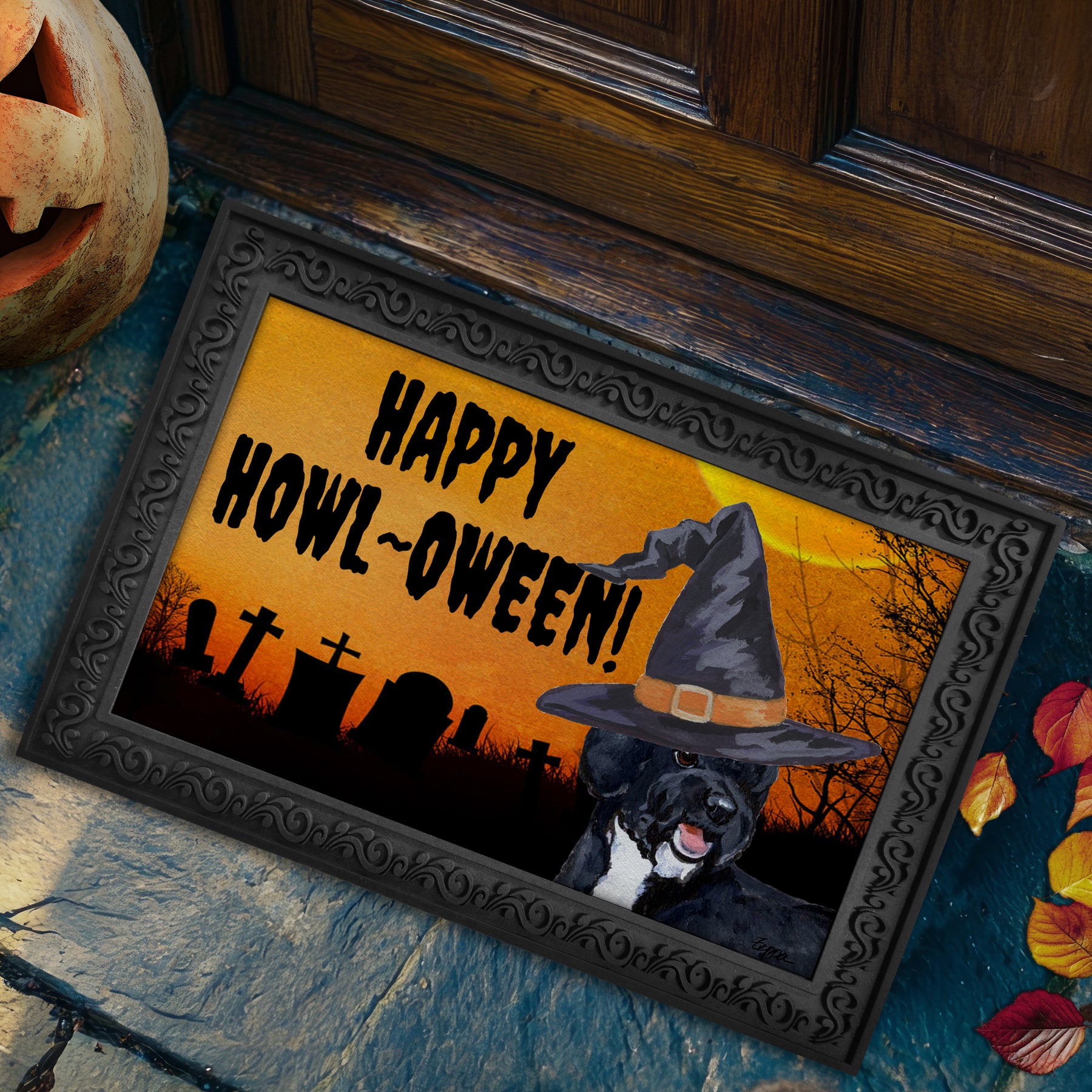 A Portuguese Water Dog in a witch's hat on a Happy Howl-oween Doormat.