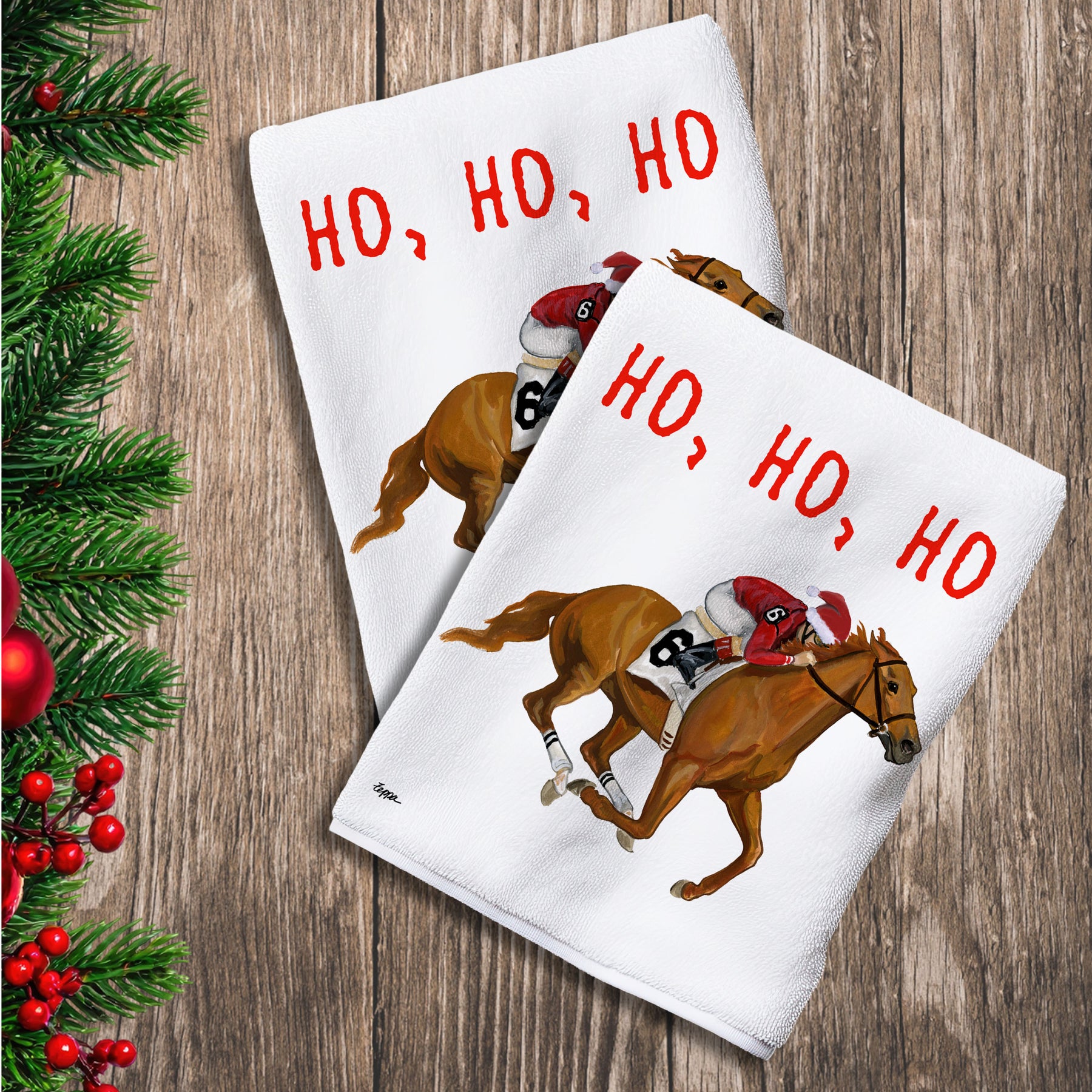 2 Kitchen Towels with a RaceHorse and Jockey  in a Santa Hat and Ho Ho Ho text.
