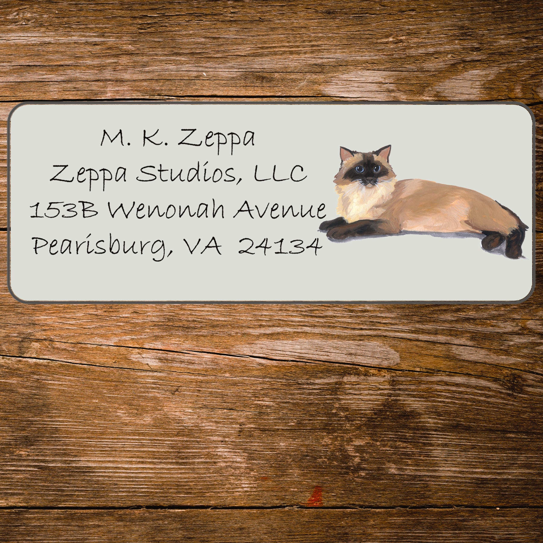 Return address label with a Rag Doll Cat illustration.