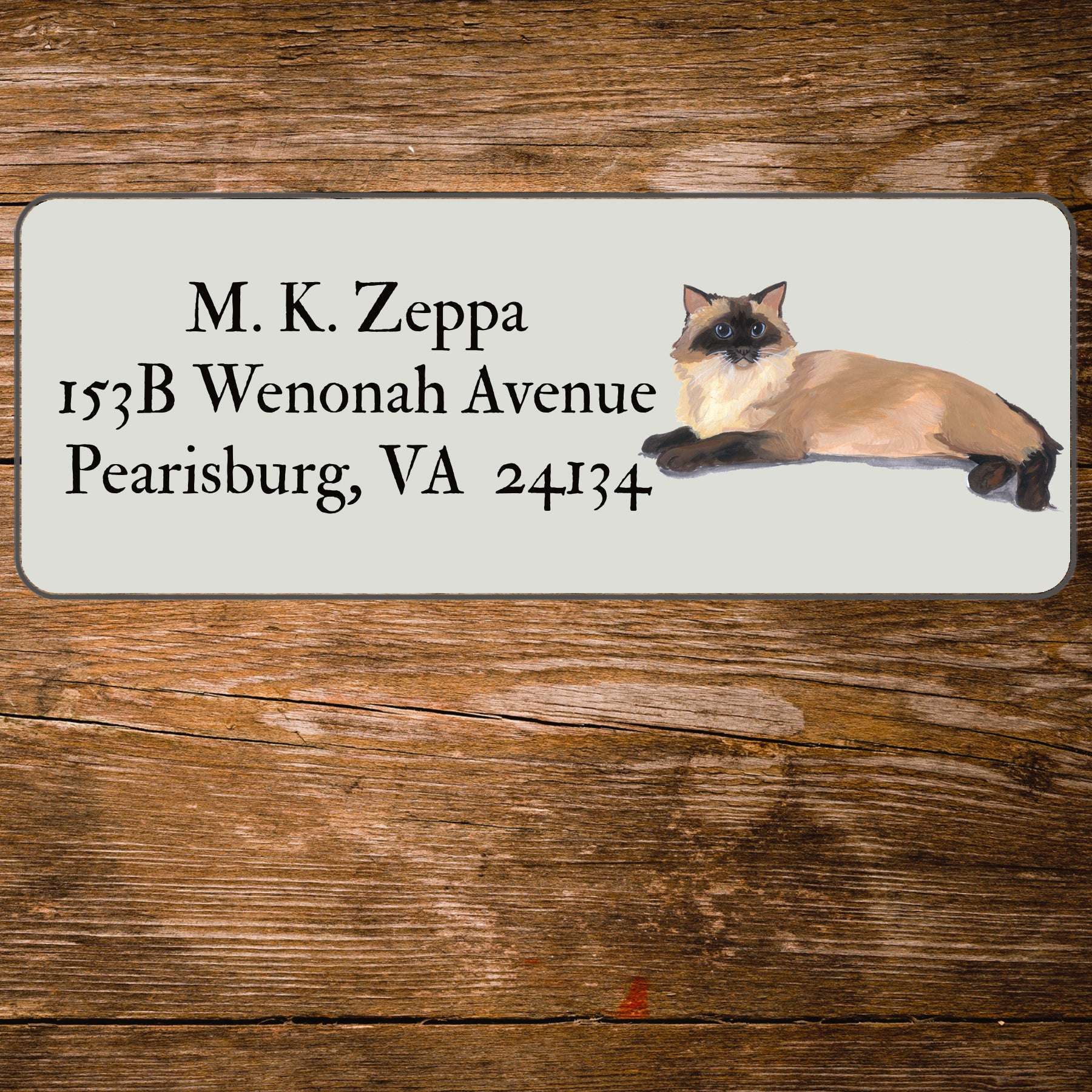 Return address label with a Rag Doll Cat illustration.