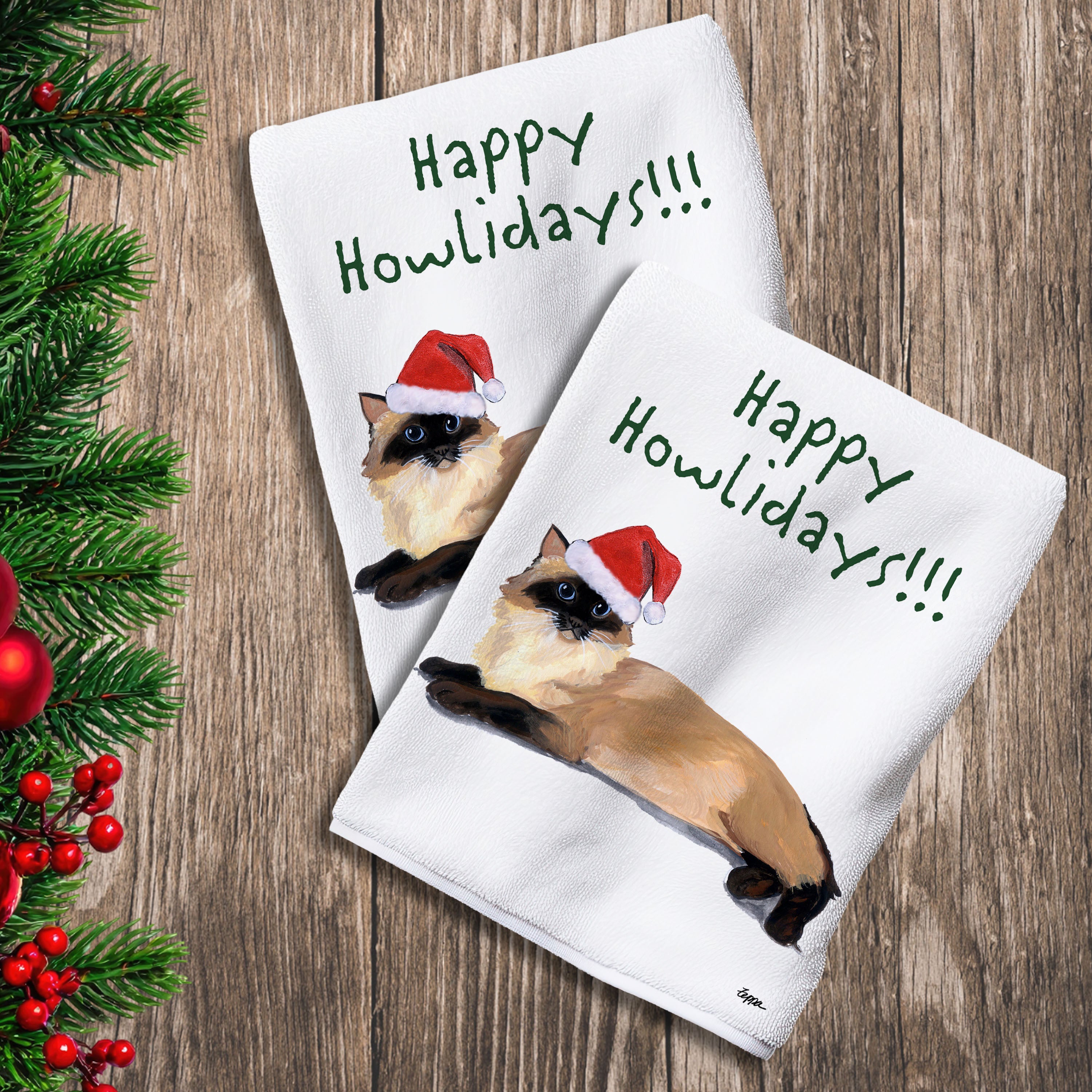 2 Kitchen Towels with a Ragdoll Cat in a Santa Hat and Happy Howlidays text.
