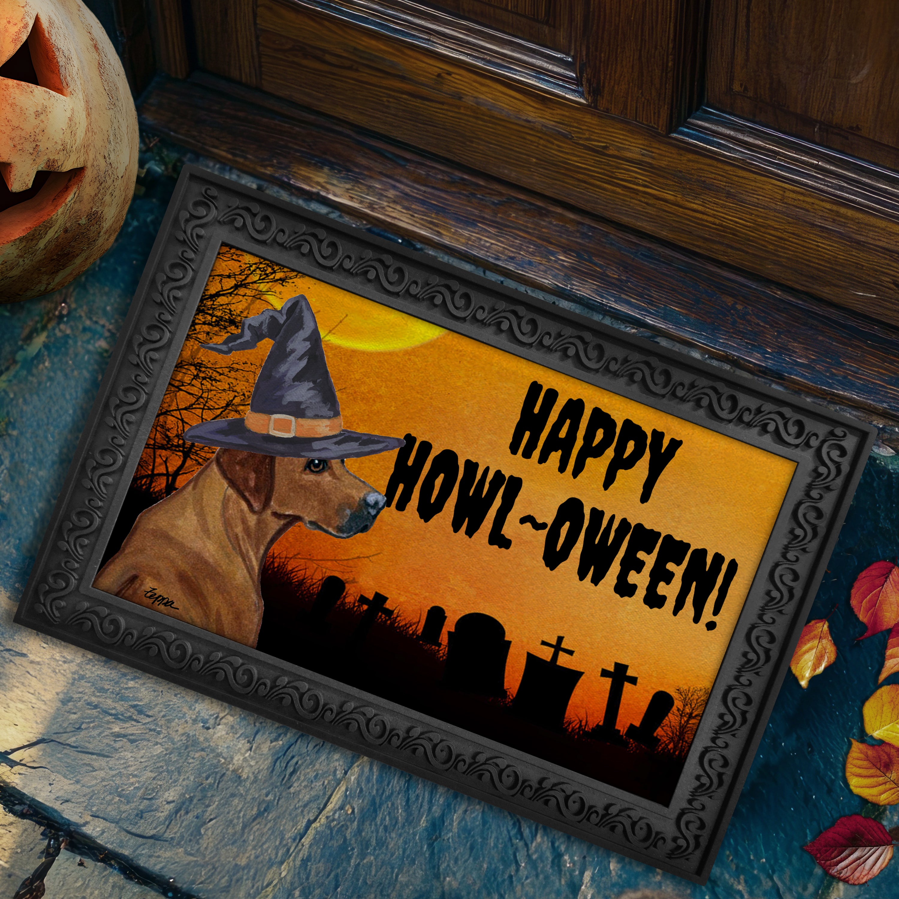 Halloween-themed doormat with a Rhodesian Ridgeback wearing a witch hat and 'Happy Howl-Oween!' text.