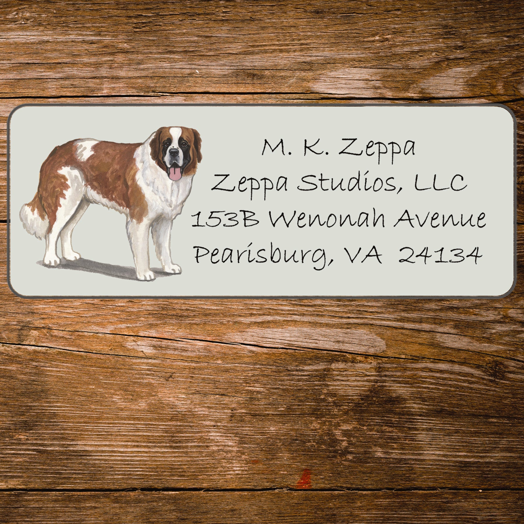 Return address label with a Saint Bernard illustration.