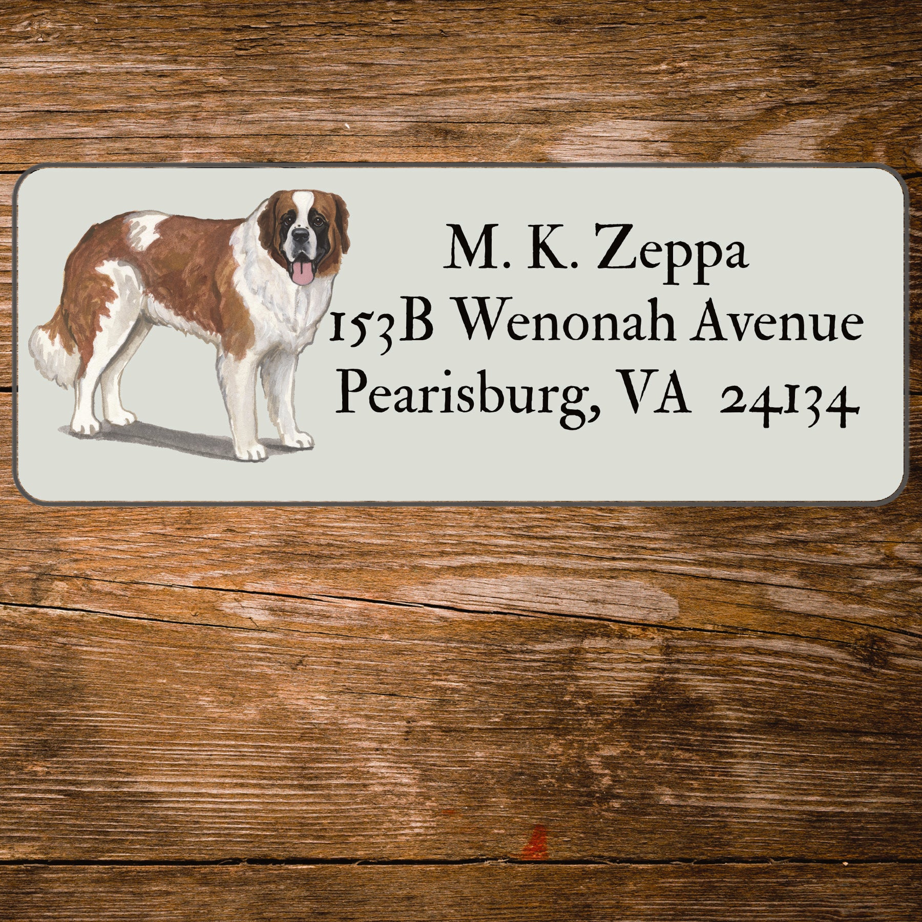 Return address label with a Saint Bernard illustration.