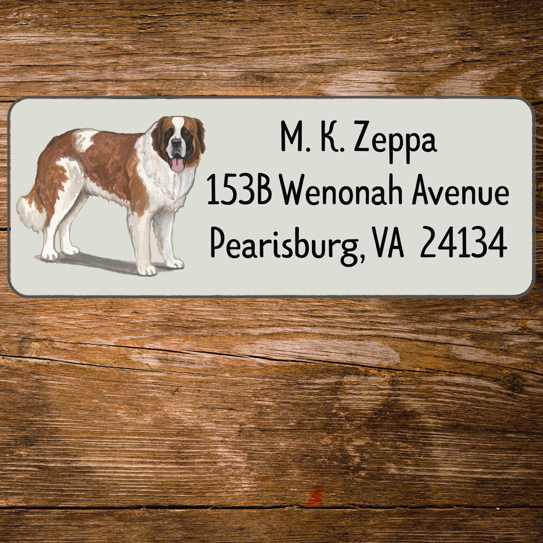 Return address label with a Saint Bernard illustration.