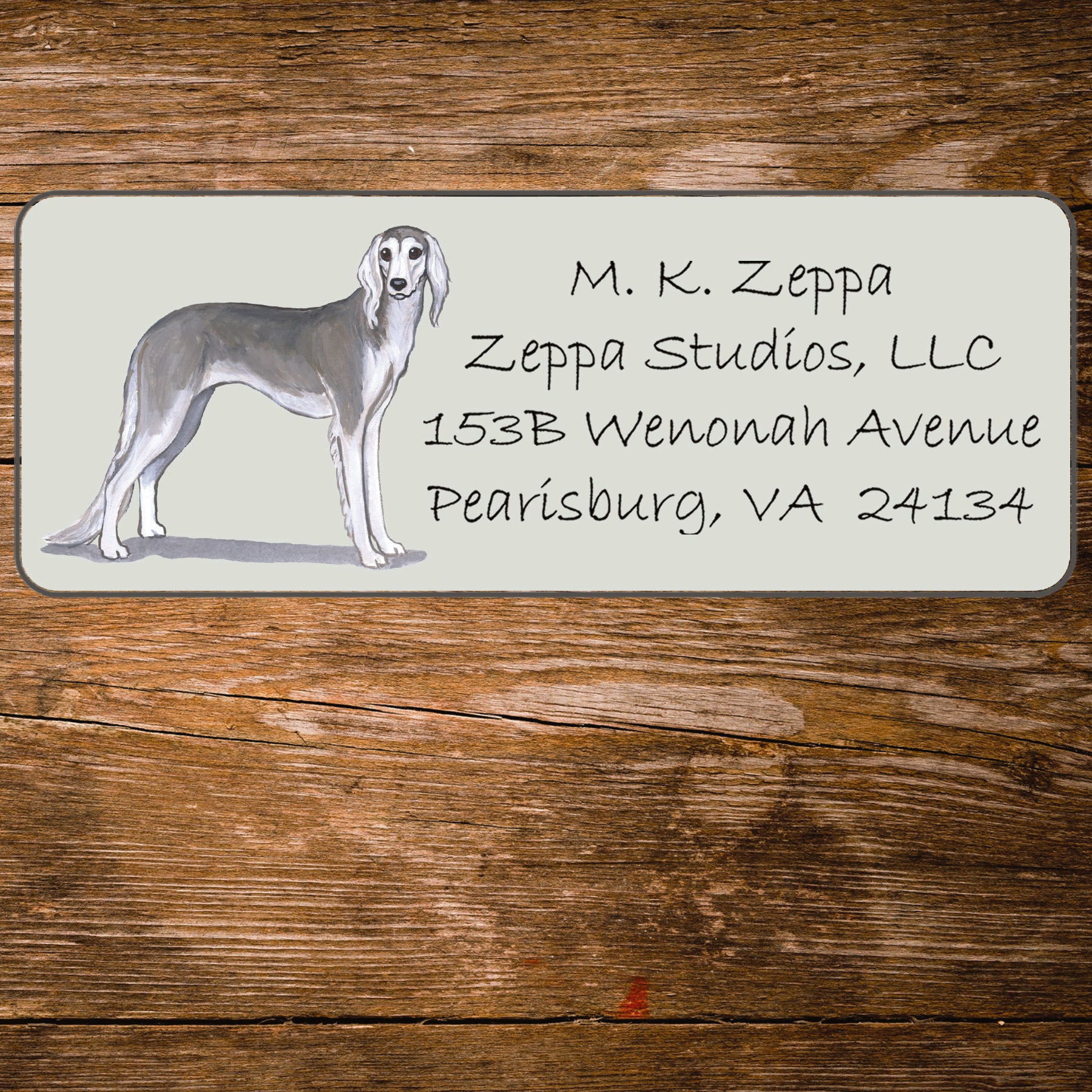 Return address label with a Saluki illustration.