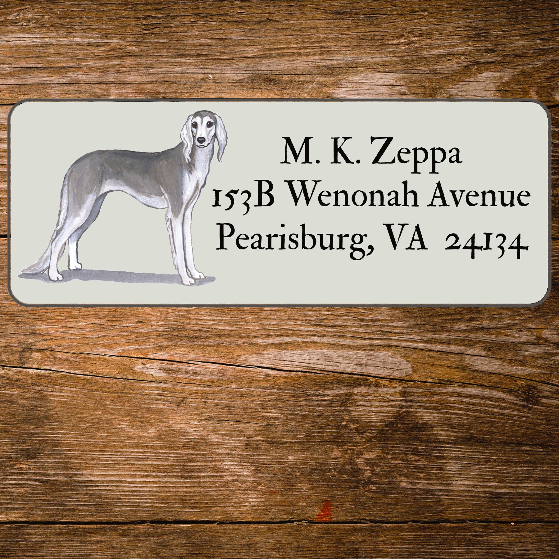 Return address label with a Saluki illustration.
