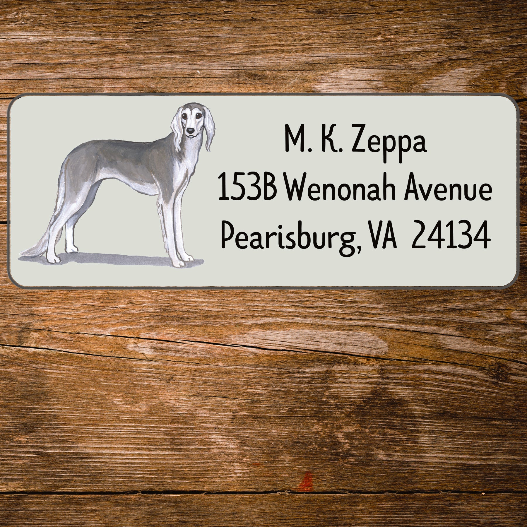 Return address label with a Saluki illustration.