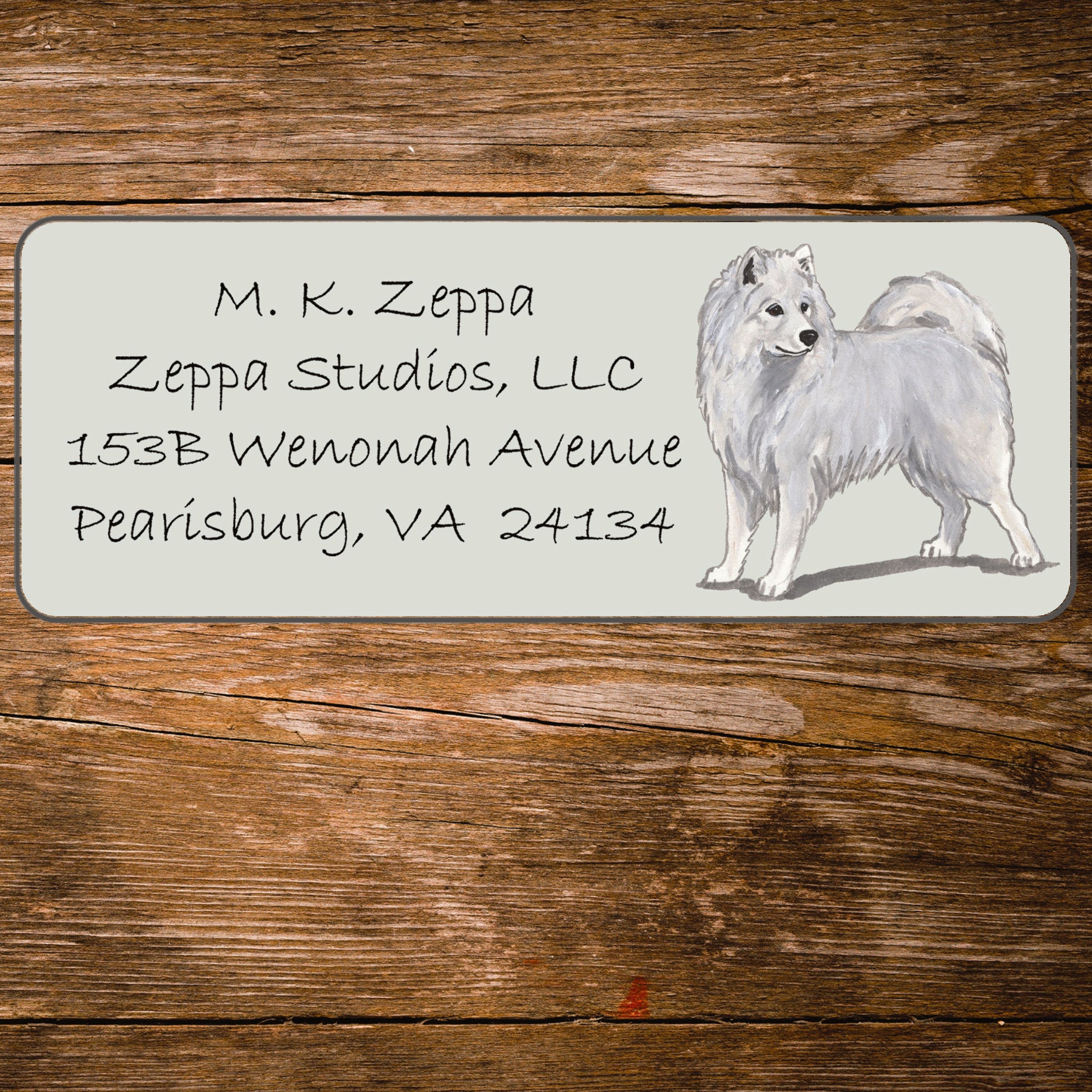 Return address label with a Samoyed illustration.