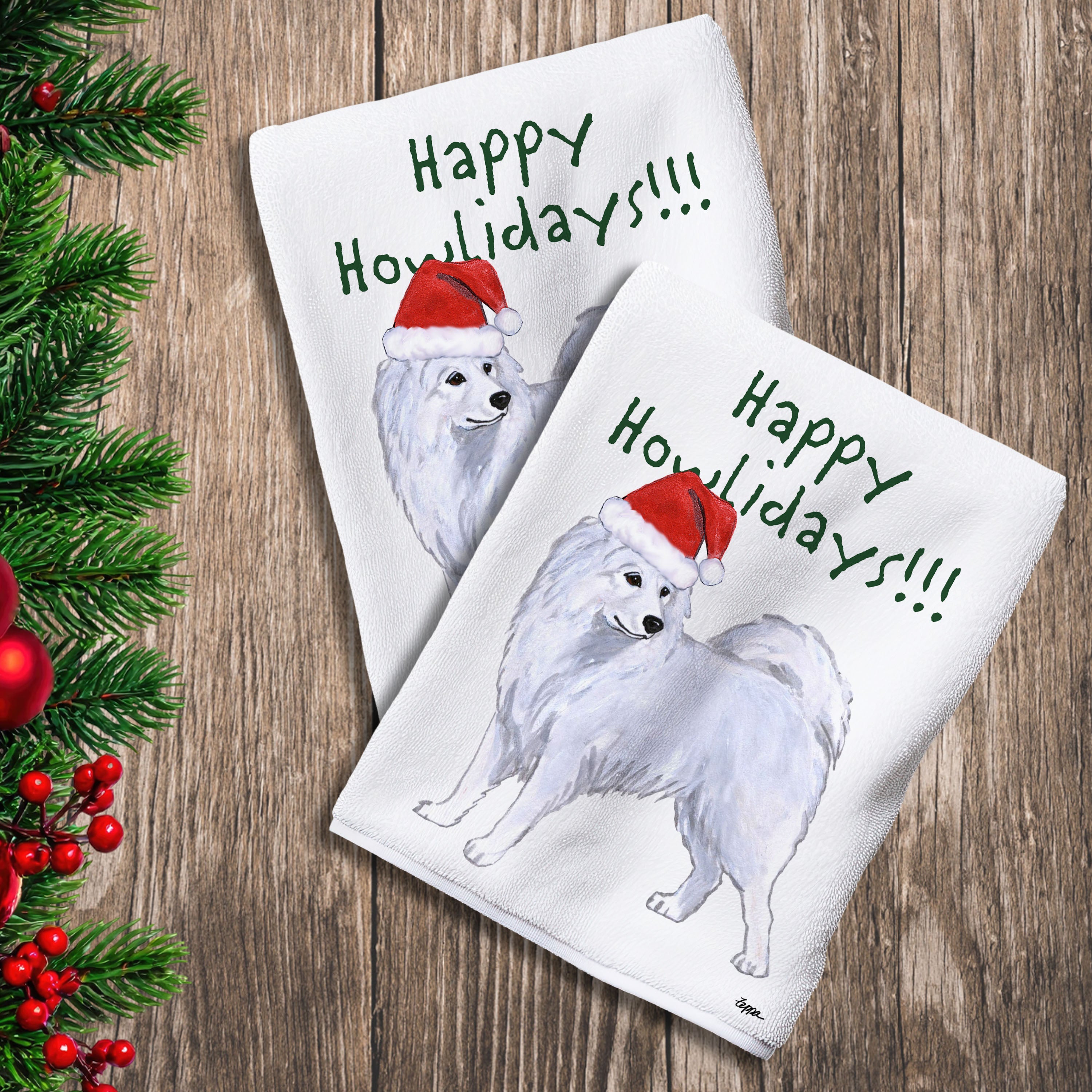 2 Kitchen Towels with a Samoyed in a Santa Hat and Happy Howlidays text.
