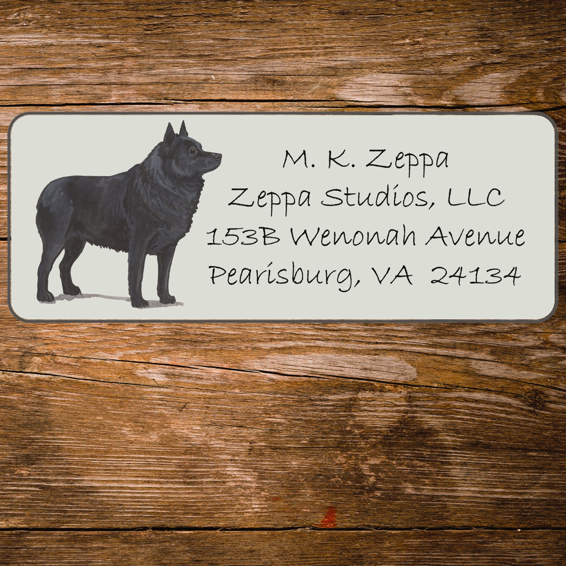 Return address label with a Schipperke illustration.