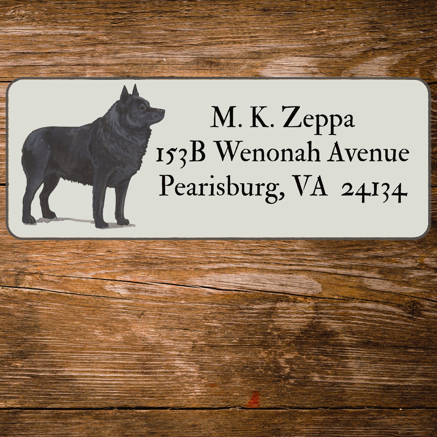 Return address label with a Schipperke illustration.