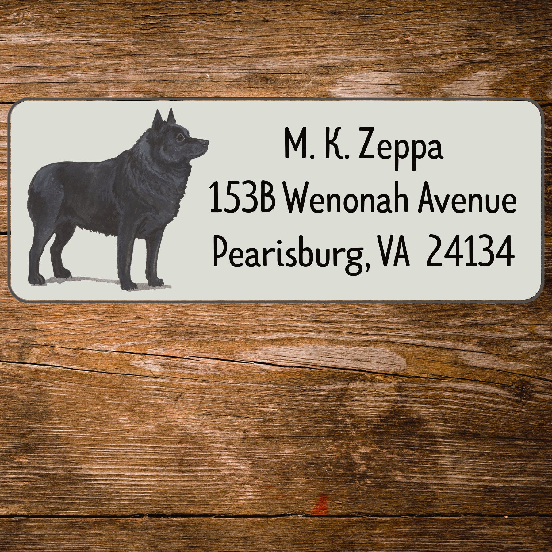 Return address label with a Schipperke illustration.