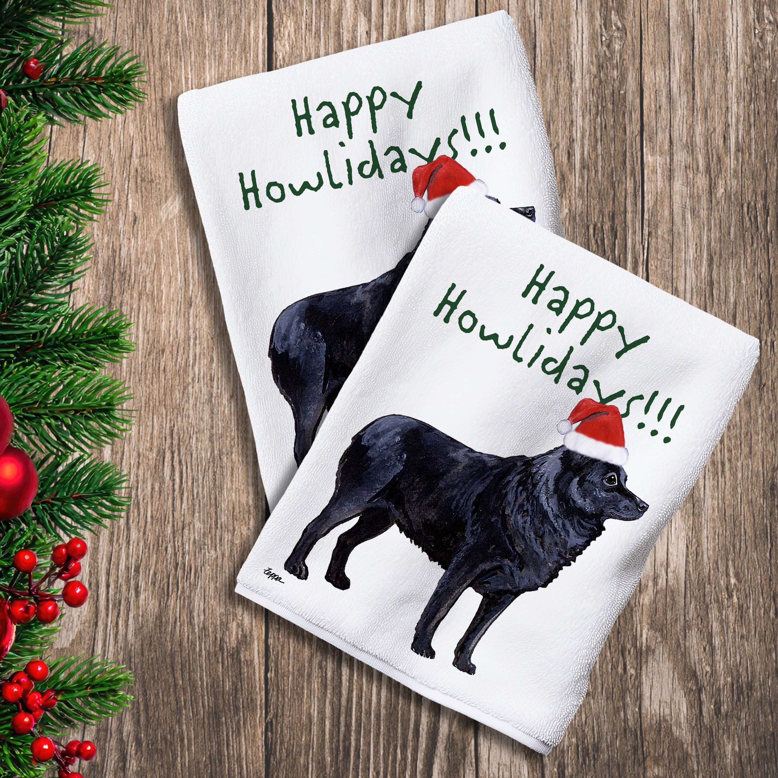 2 Kitchen Towels with a Schipperke in a Santa Hat and Happy Howlidays text.
