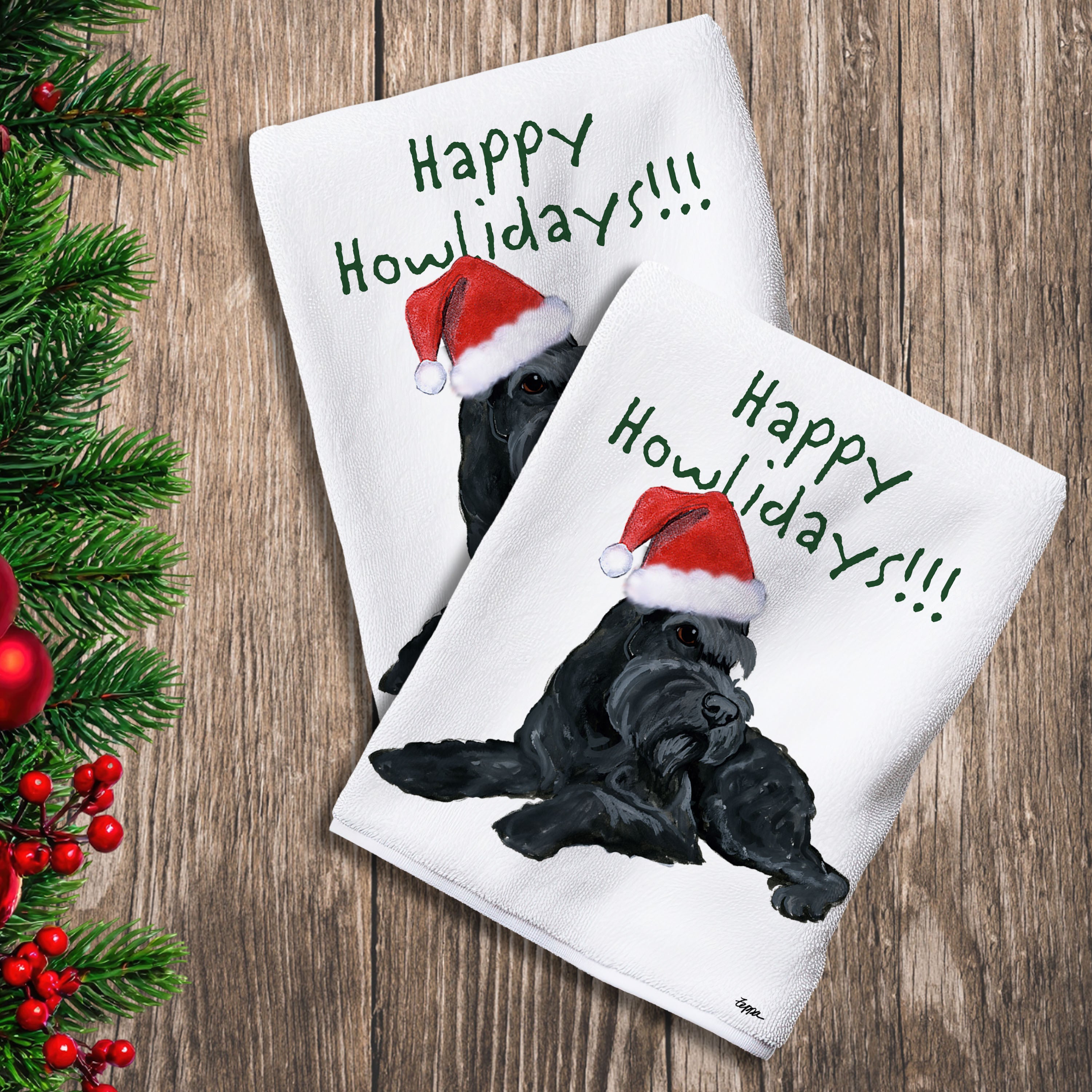 2 Kitchen Towels with a black mini Schnauzer in a Santa Hat and Happy Howlidays text.
