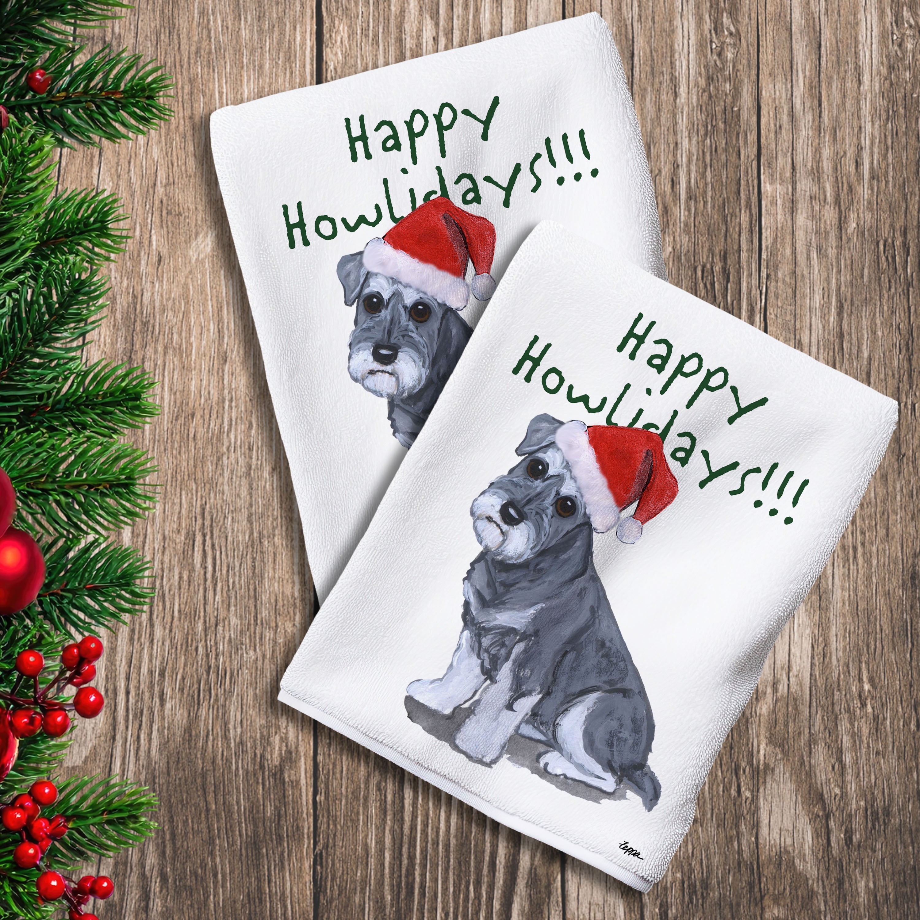 2 Kitchen Towels with a Schnauzer puppy in a Santa Hat and Happy Howlidays text.
