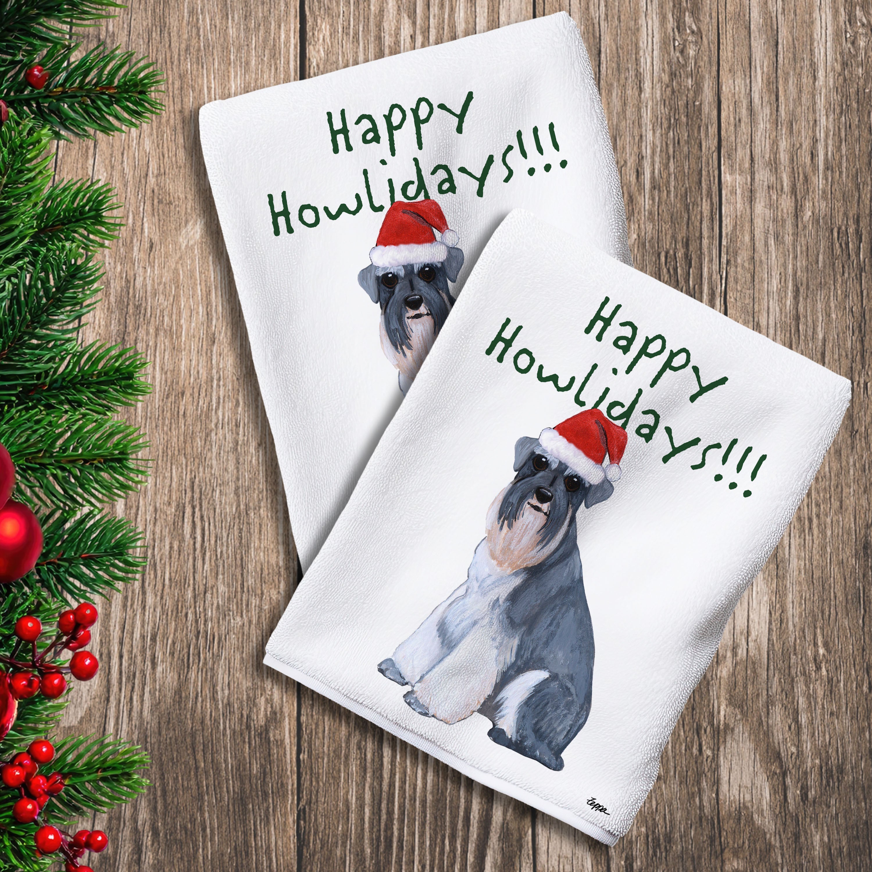 2 Kitchen Towels with a Schnauzer with natural ears in a Santa Hat and Happy Howlidays text.
