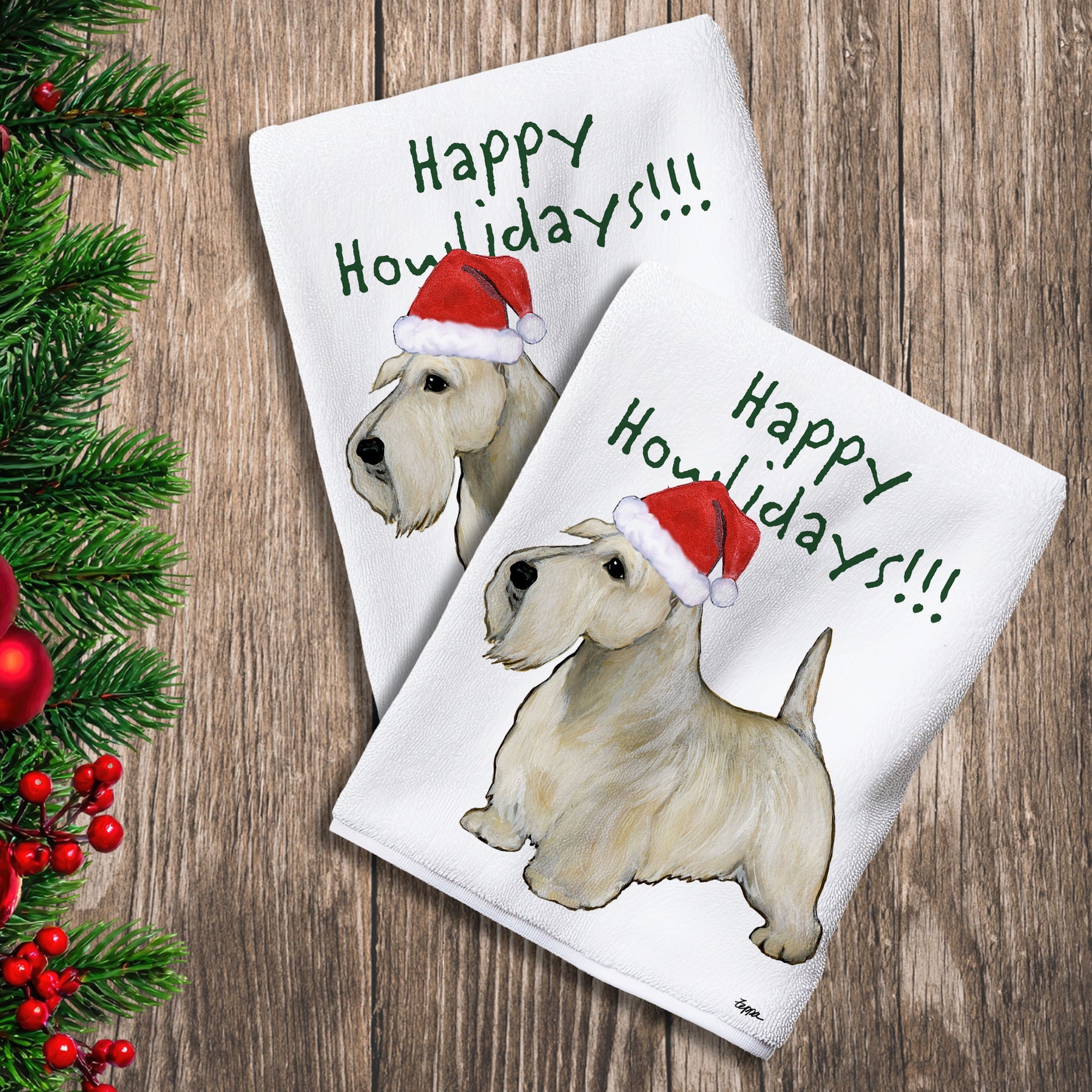 2 Kitchen Towels with a wheaten Scottish Terrier in a Santa Hat and Happy Howlidays text.
