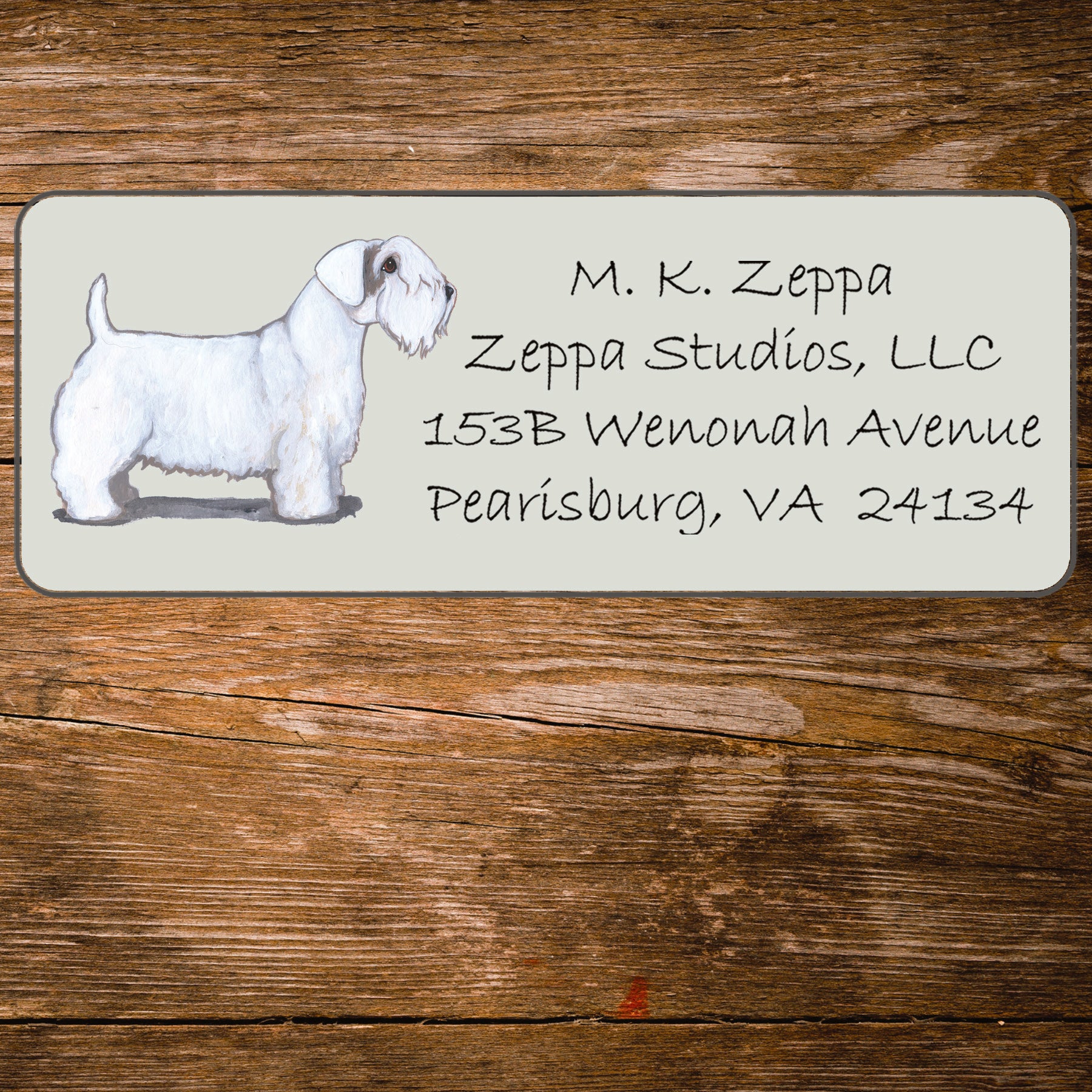 Return address label with a Sealyham Terrier illustration.