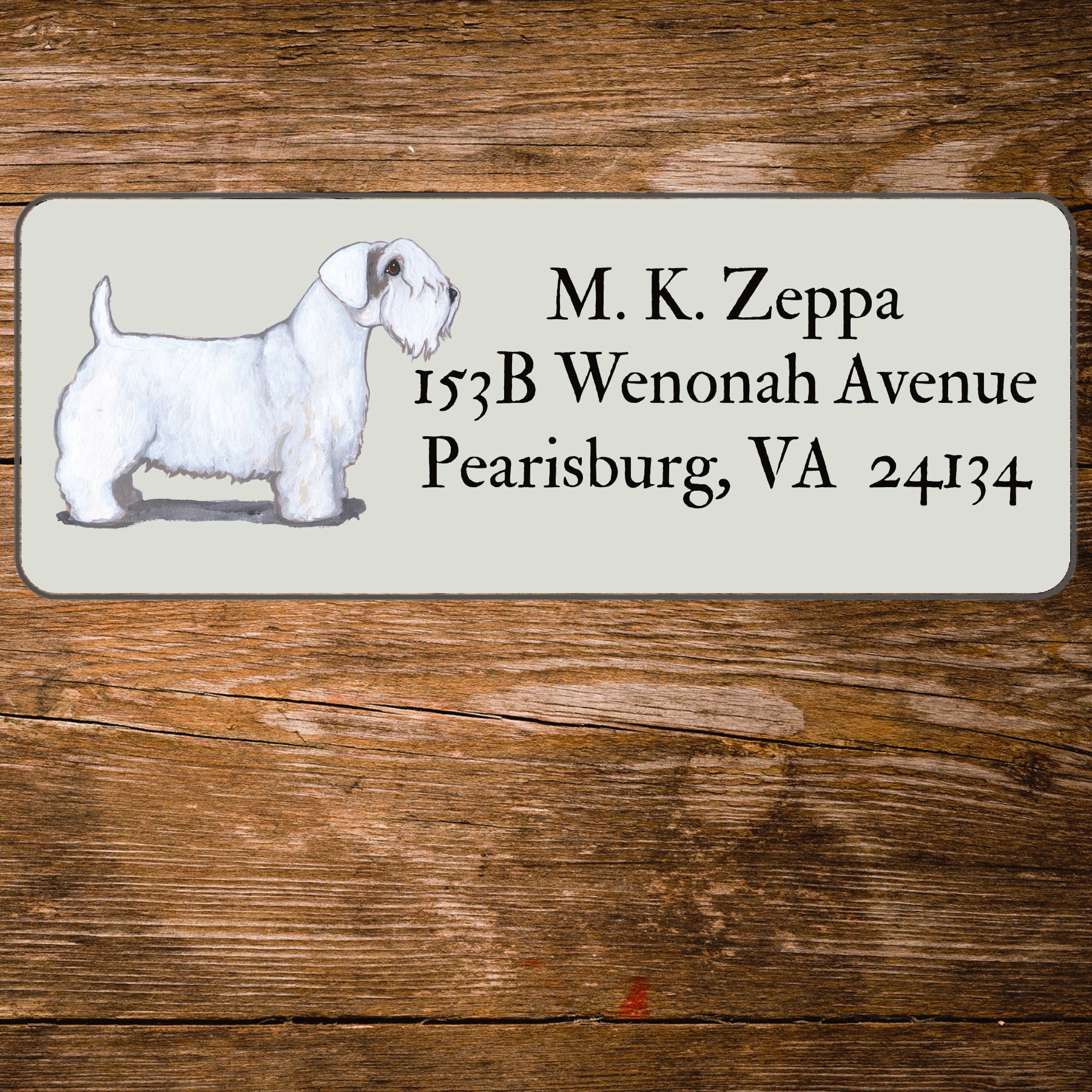 Return address label with a Sealyham Terrier illustration.