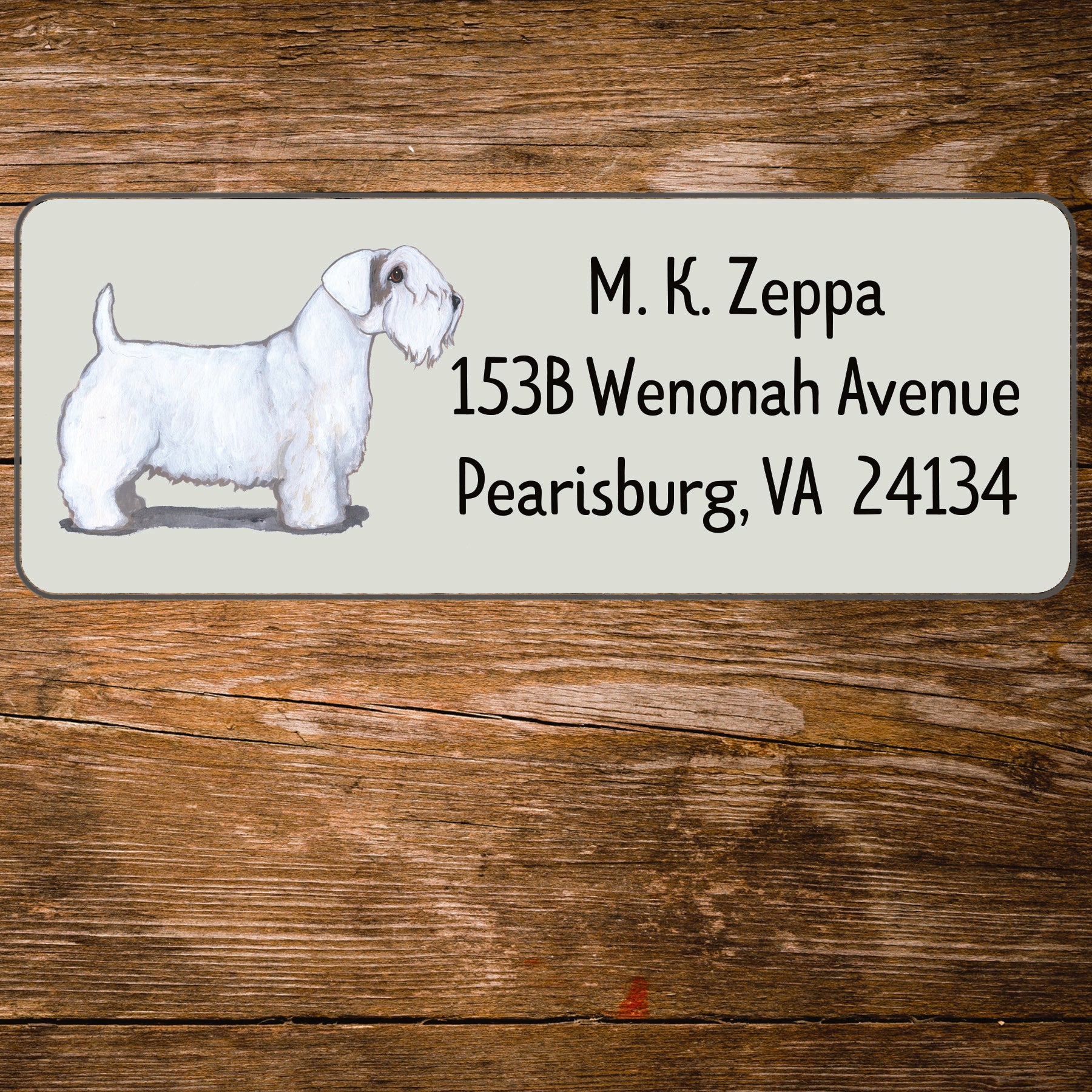 Return address label with a Sealyham Terrier illustration.