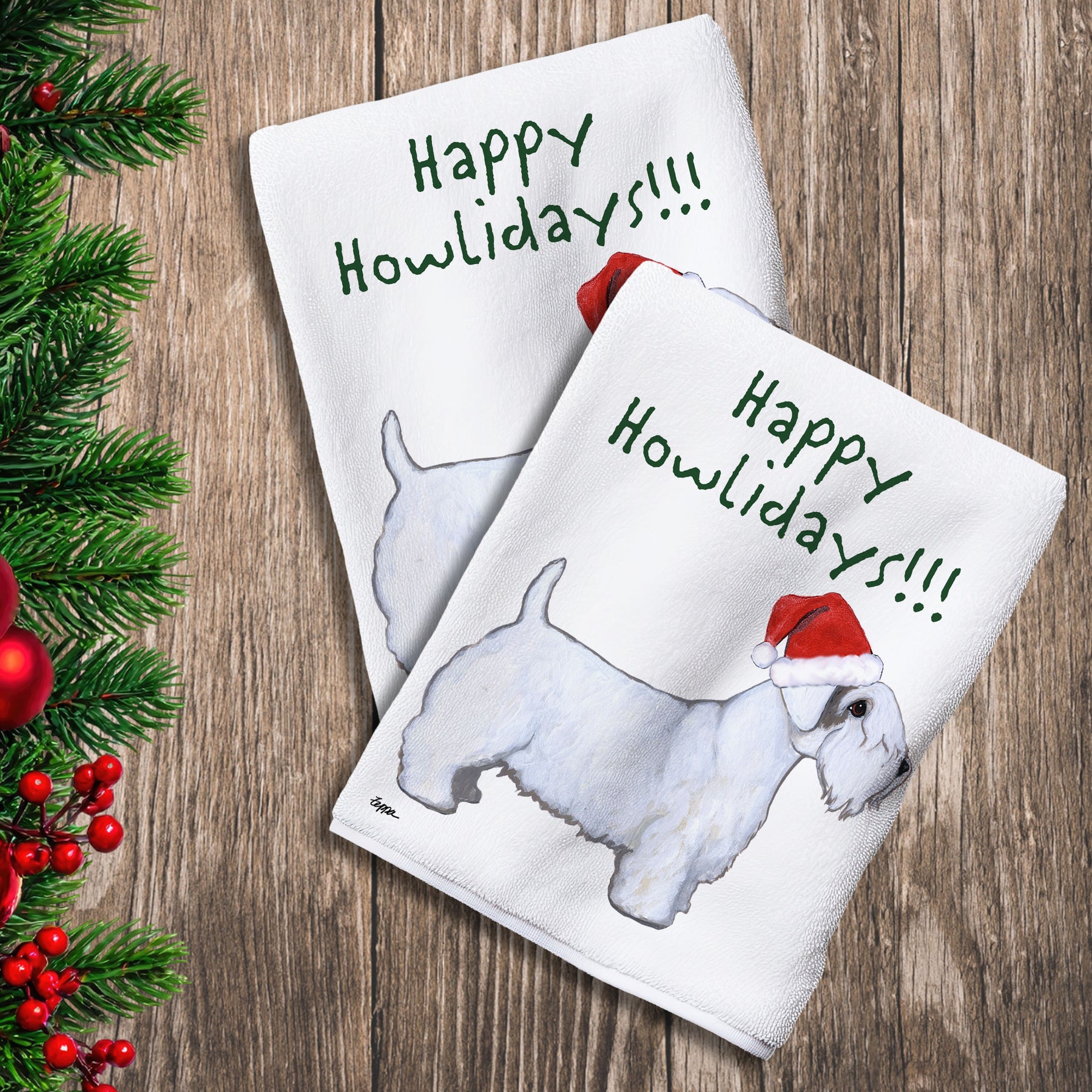 2 Kitchen Towels with a Sealyham Terrier in a Santa Hat and Happy Howlidays text.
