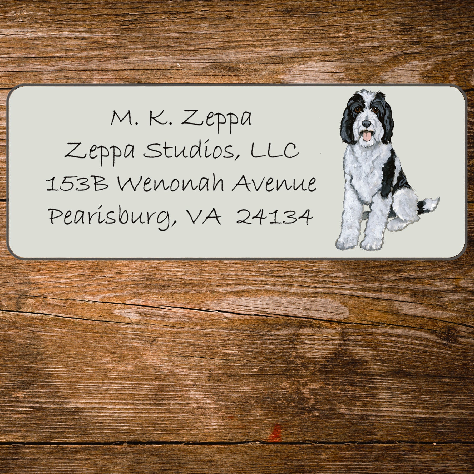 Return address label with an illustration of a Sheepadoodle