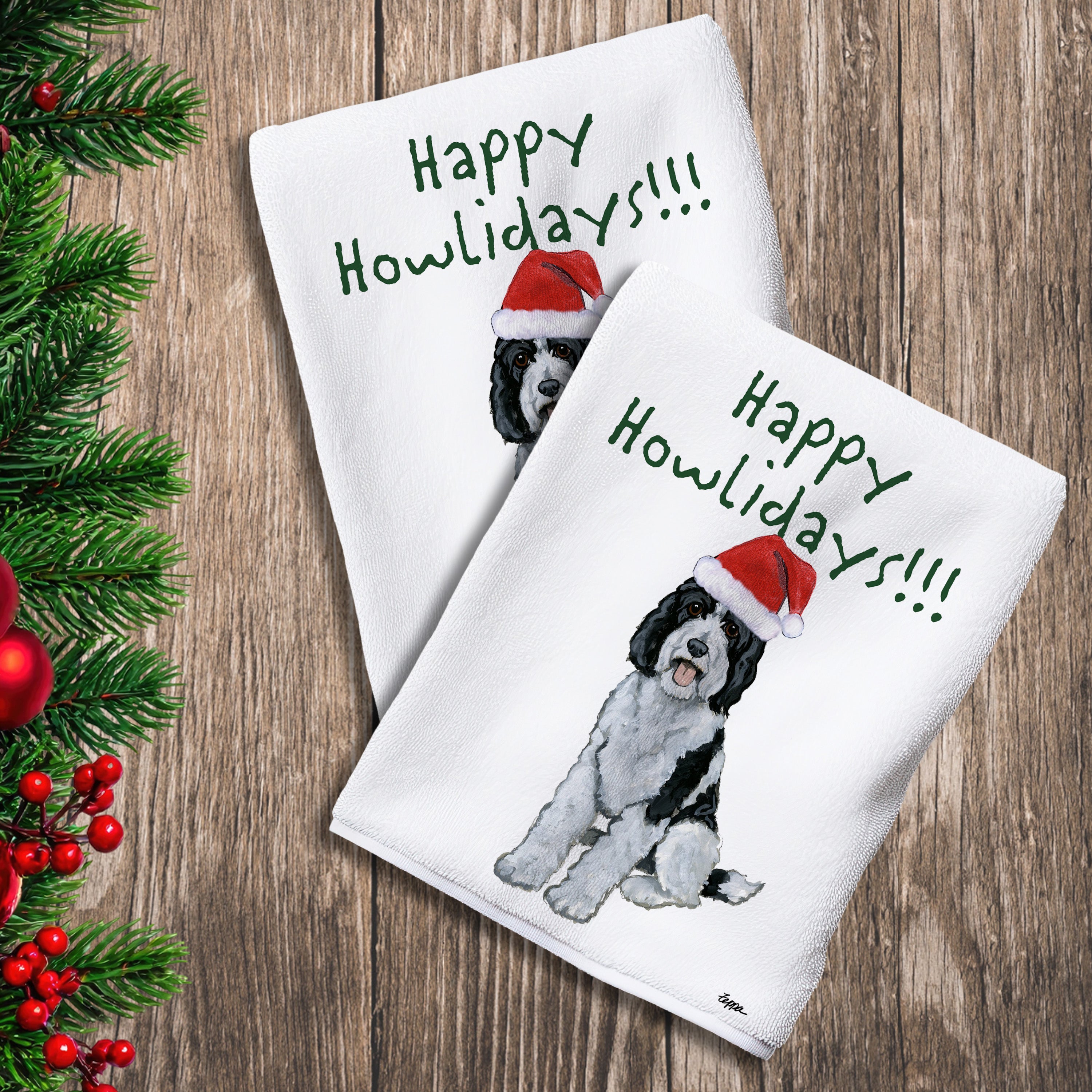 2 Kitchen Towels with a Sheepadoodle in a Santa Hat and Happy Howlidays text.