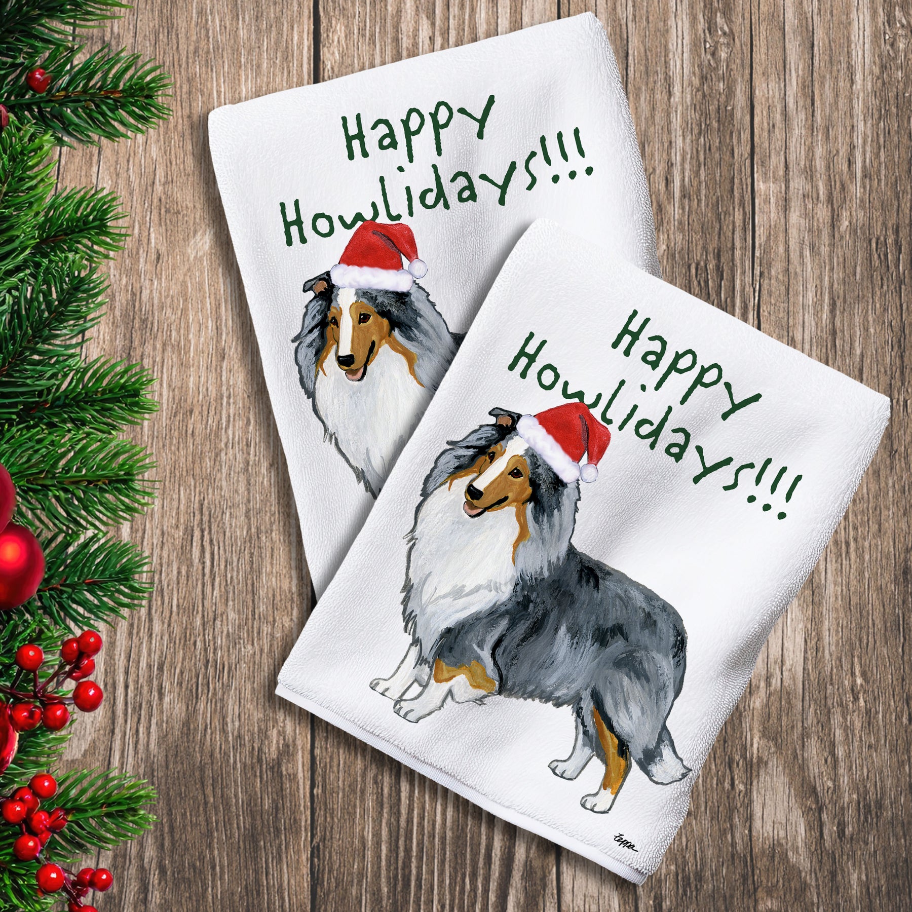 2 Kitchen Towels with a blue merle Shetland Sheepdog in a Santa Hat and Happy Howlidays text.
