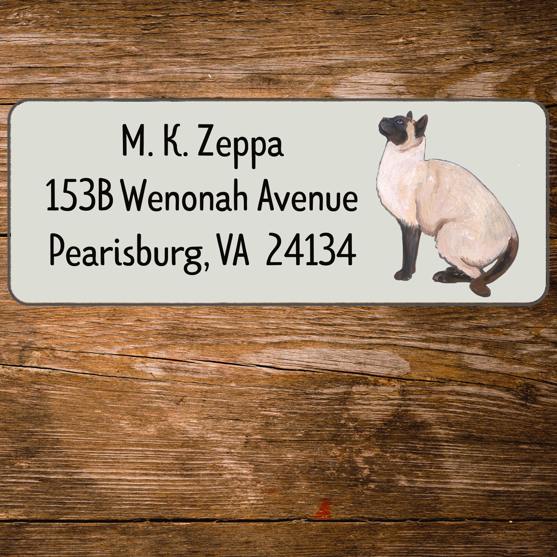 Return address label with a Siamese Cat illustration.