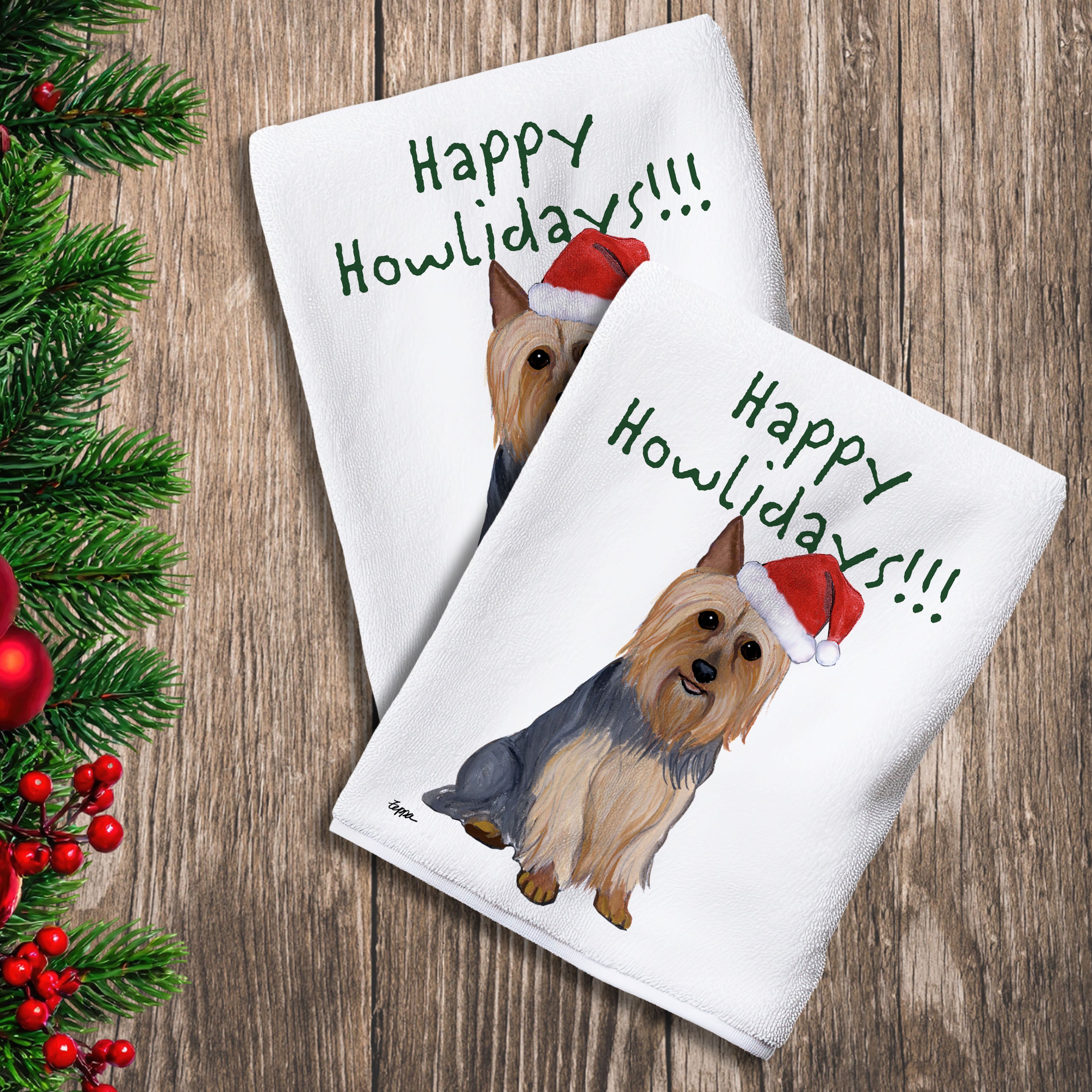 2 Kitchen Towels with a Silky Terrier in a Santa Hat and Happy Howlidays text.
