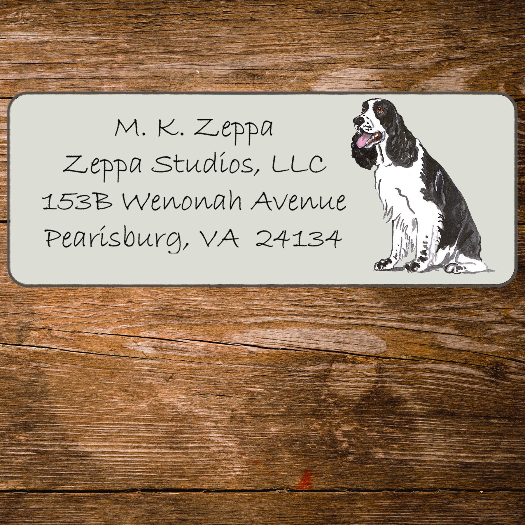 Return address label with a Springer Spaniel illustration.