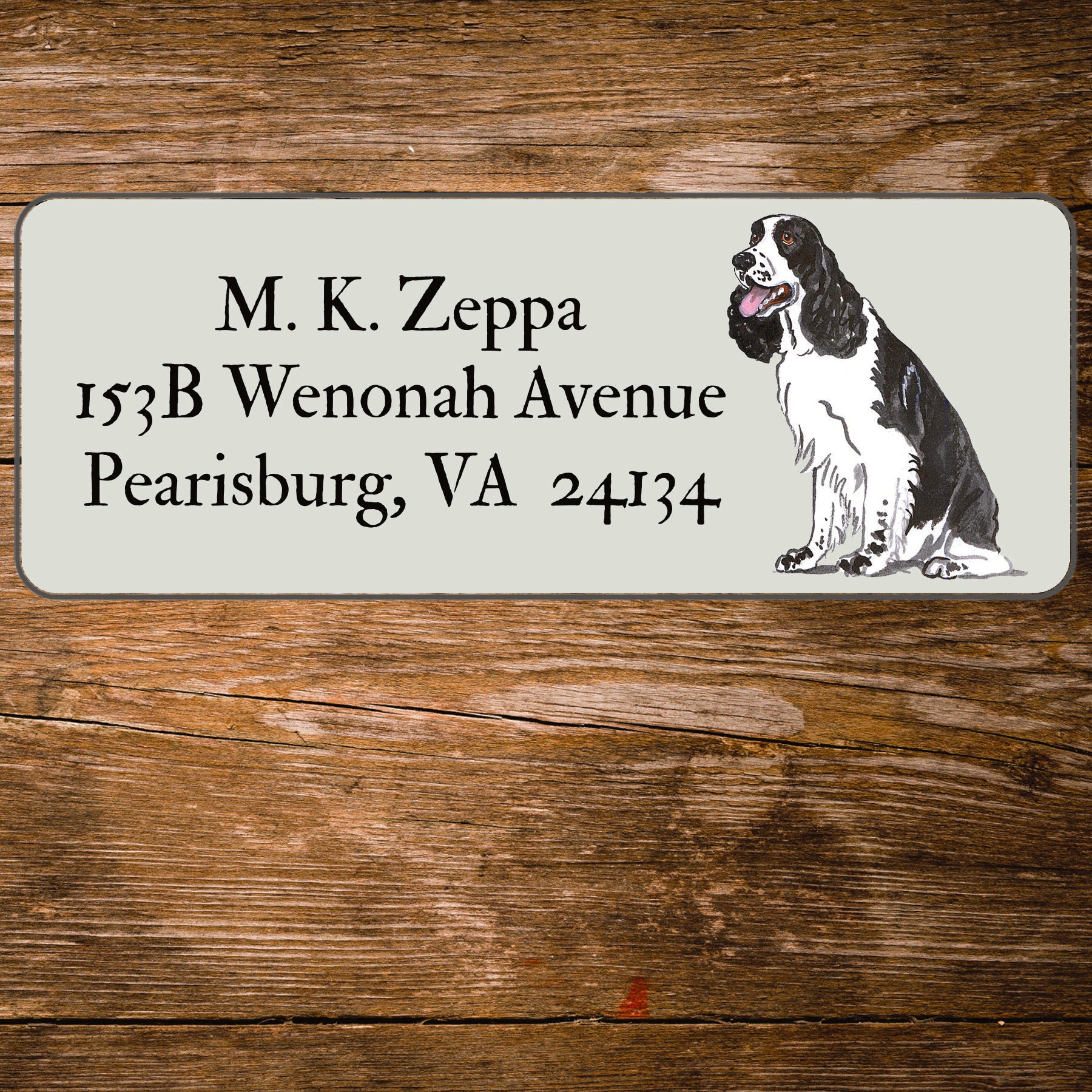 Return address label with a Springer Spaniel illustration.