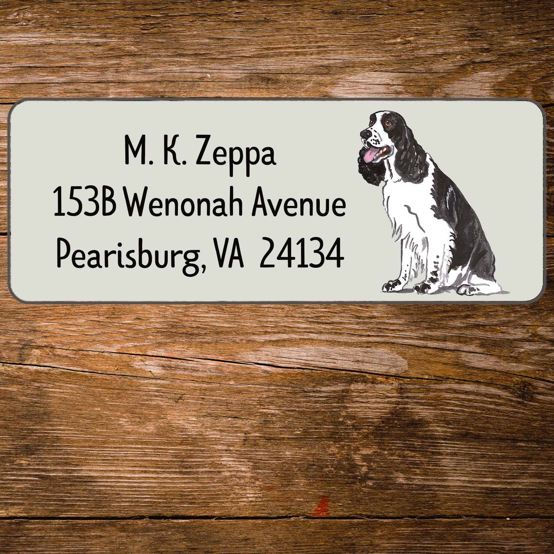 Return address label with a Springer Spaniel illustration.