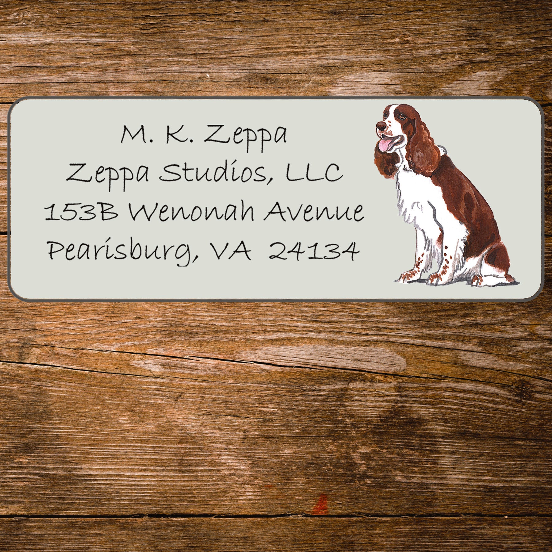 Return address label with a Springer Spaniel illustration.