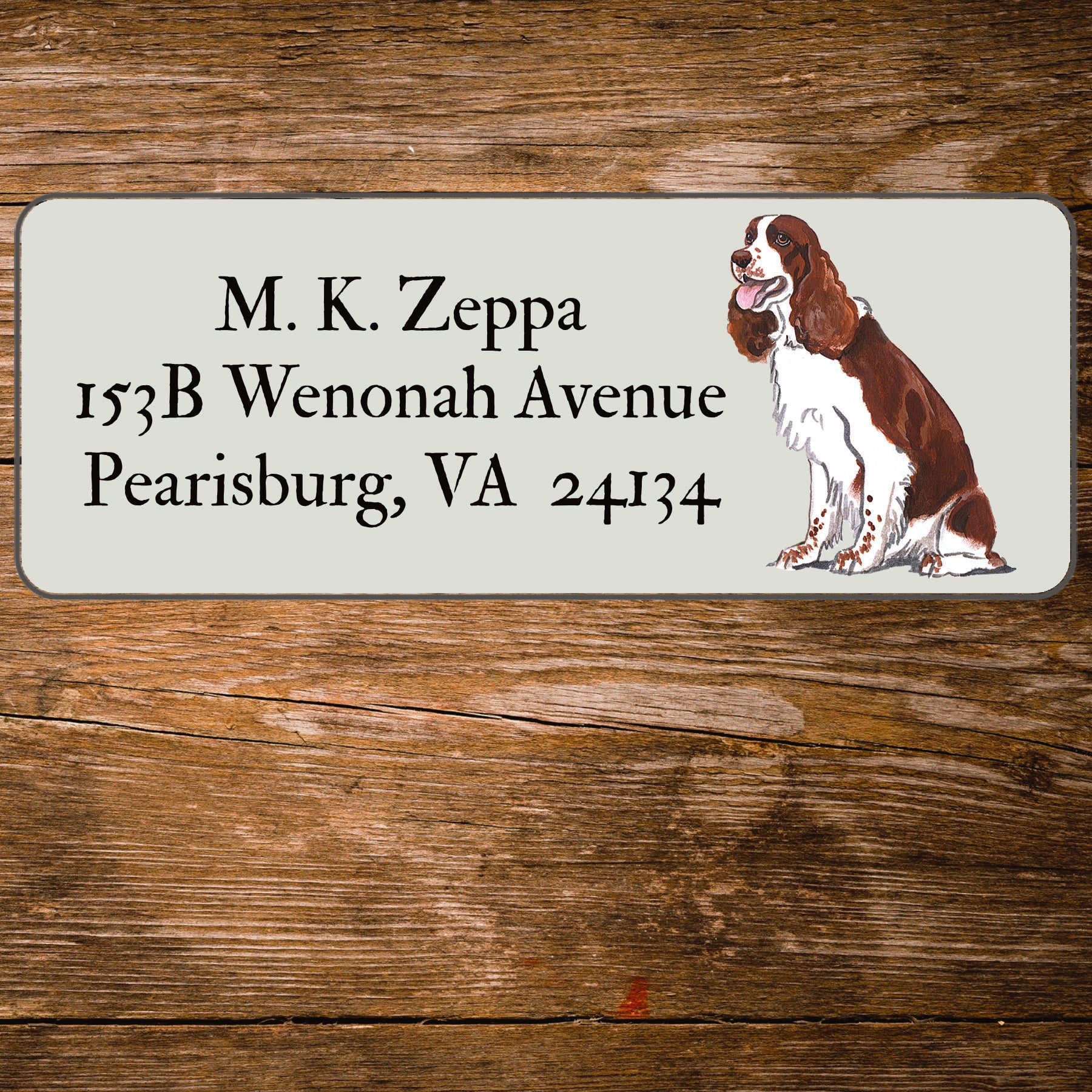 Return address label with a Springer Spaniel illustration.