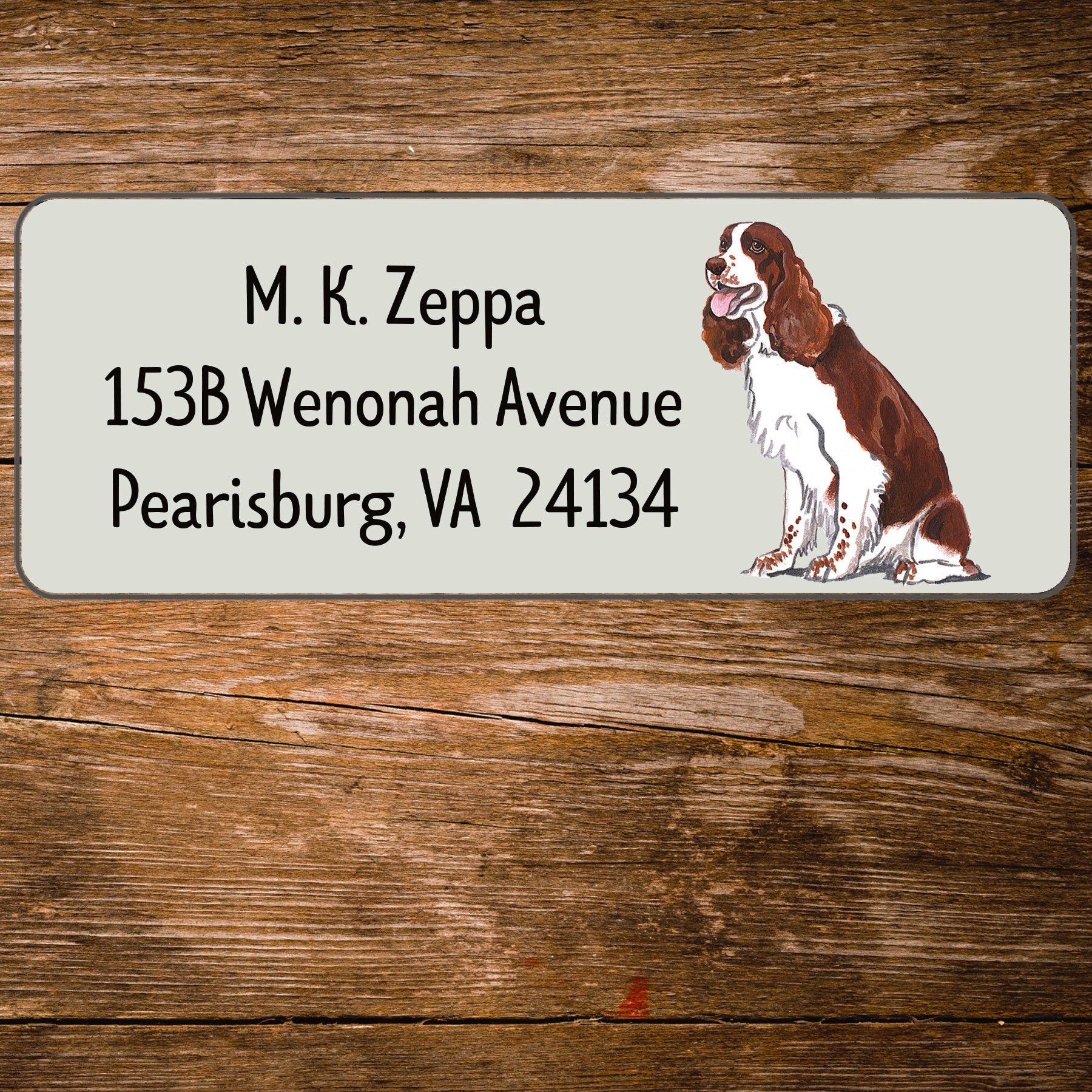 Return address label with a Springer Spaniel illustration.