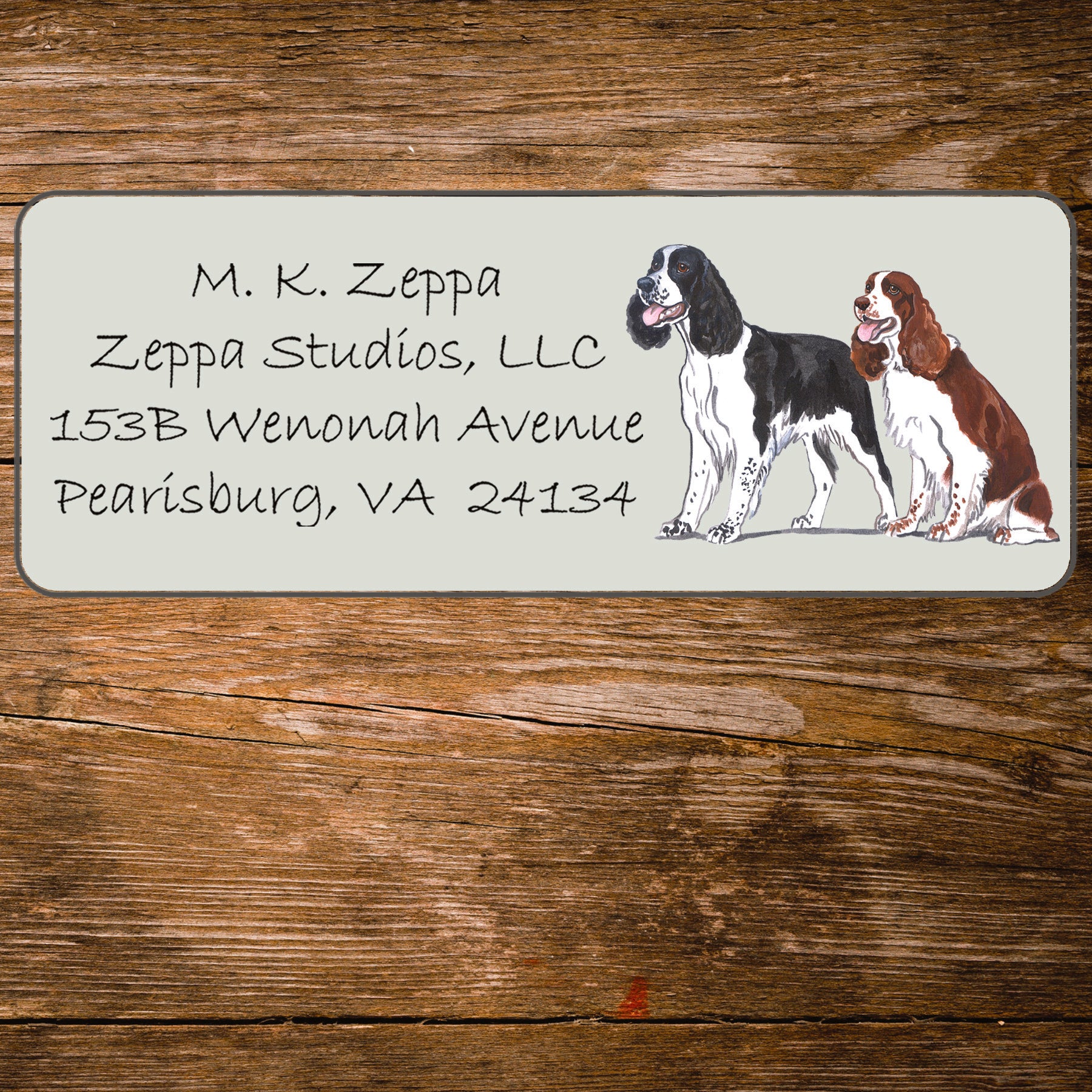 Return address label with a Springer Spaniel illustration.